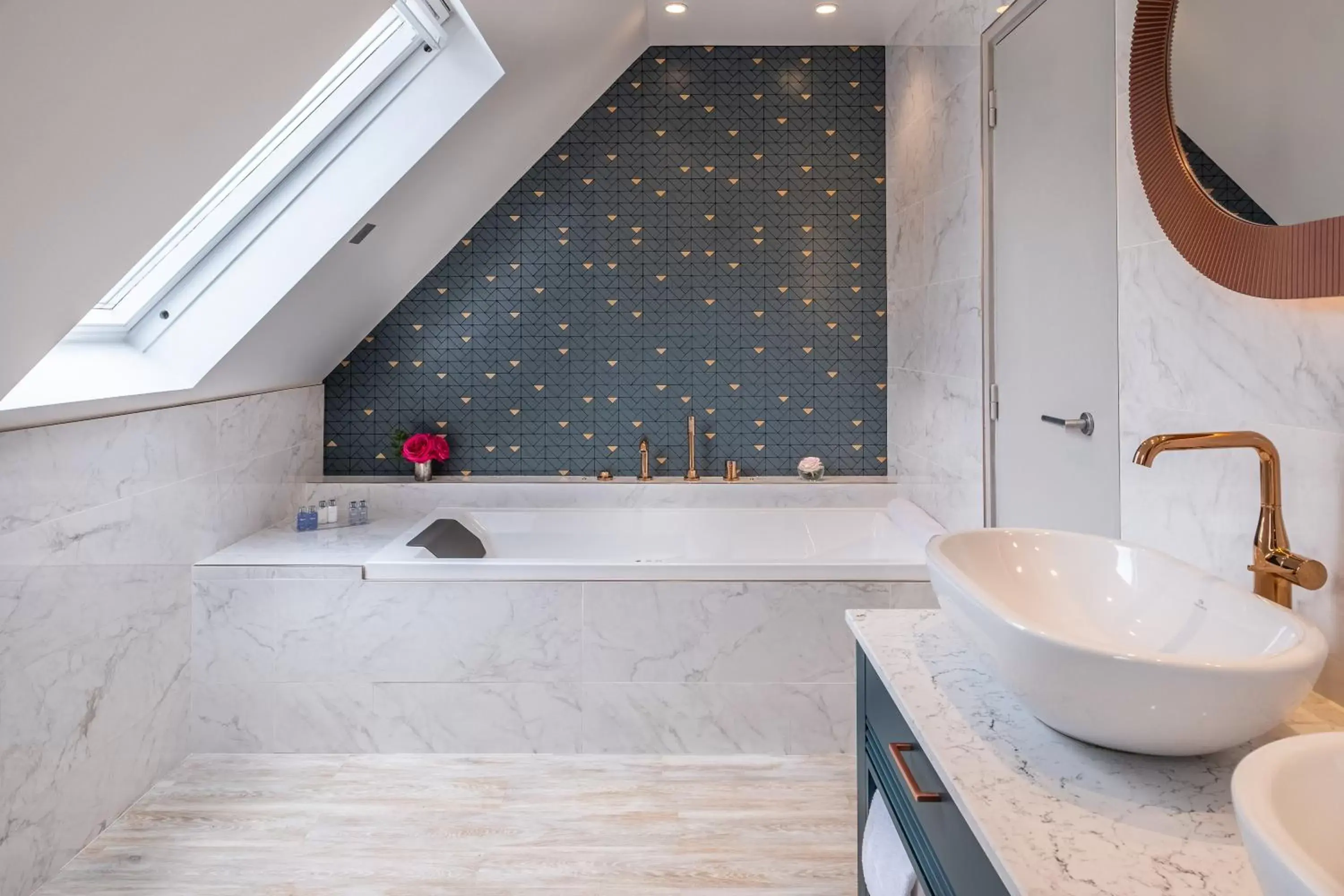 Bathroom in Hôtel Le Tourville by Inwood Hotels