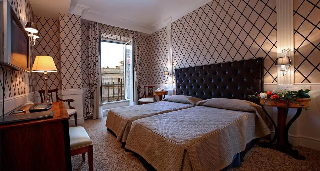 Bed in Boutique Hotel Trevi