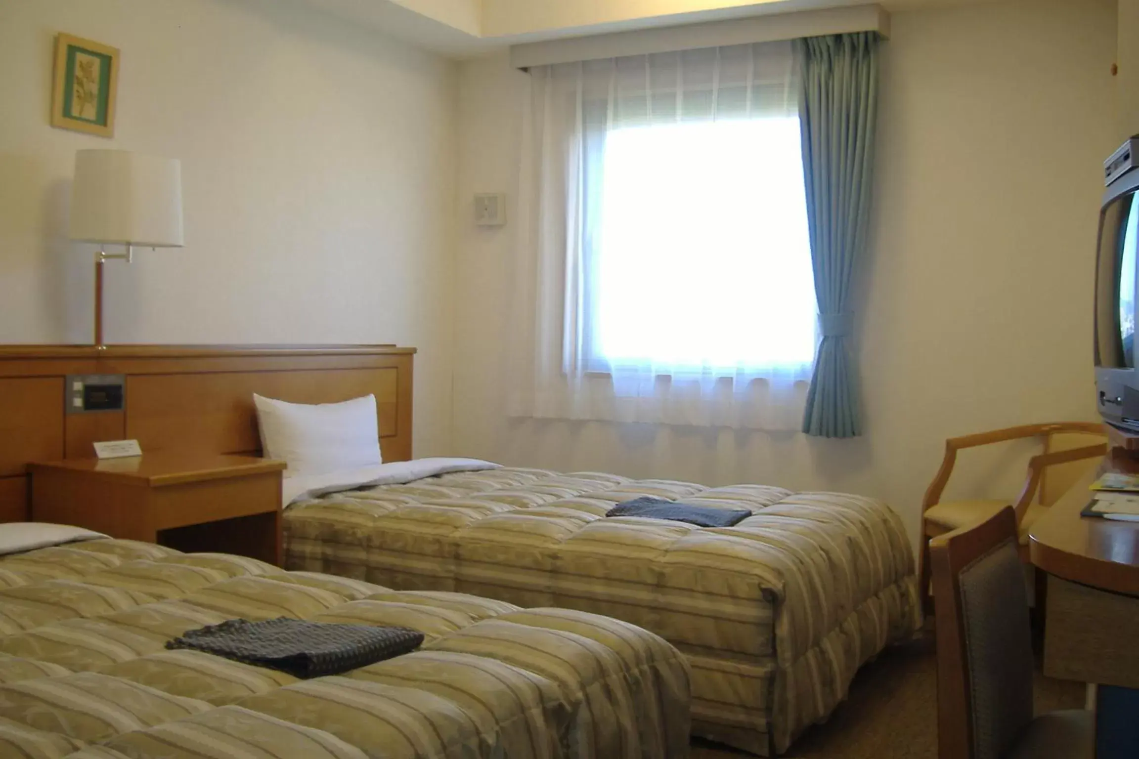 Bed in Hotel Route-Inn Nagaoka Inter