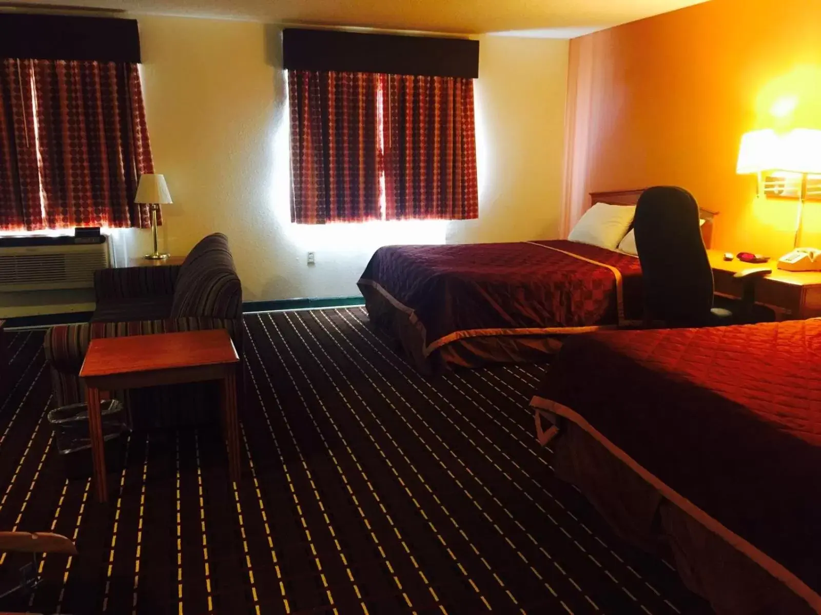Bed in Texas Inn and Suites Lufkin