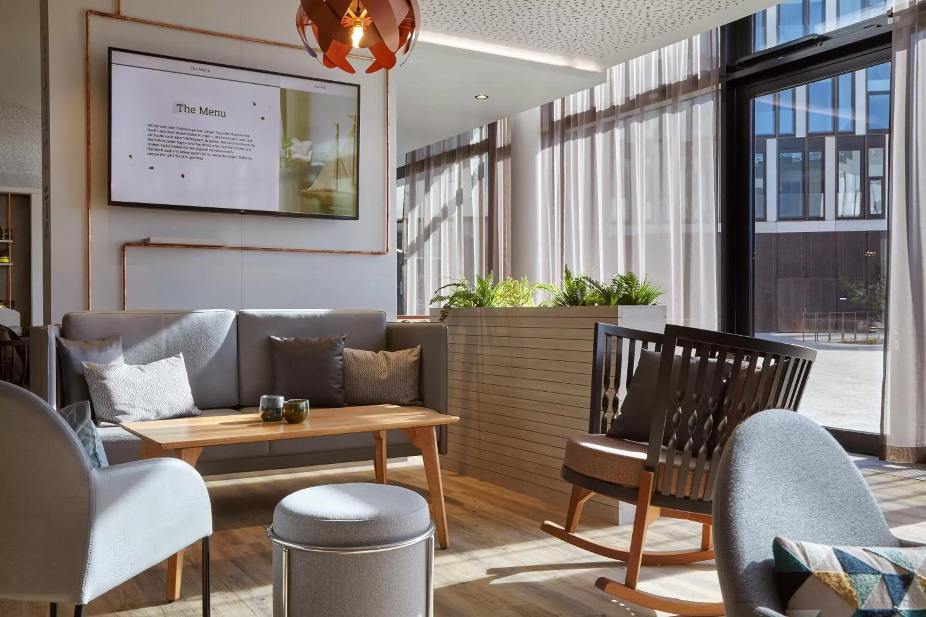 Lobby or reception in Holiday Inn - the niu, Hub Dusseldorf Messe by IHG Lobby or reception in Holiday Inn - the niu, Hub Dusseldorf Messe by IHG