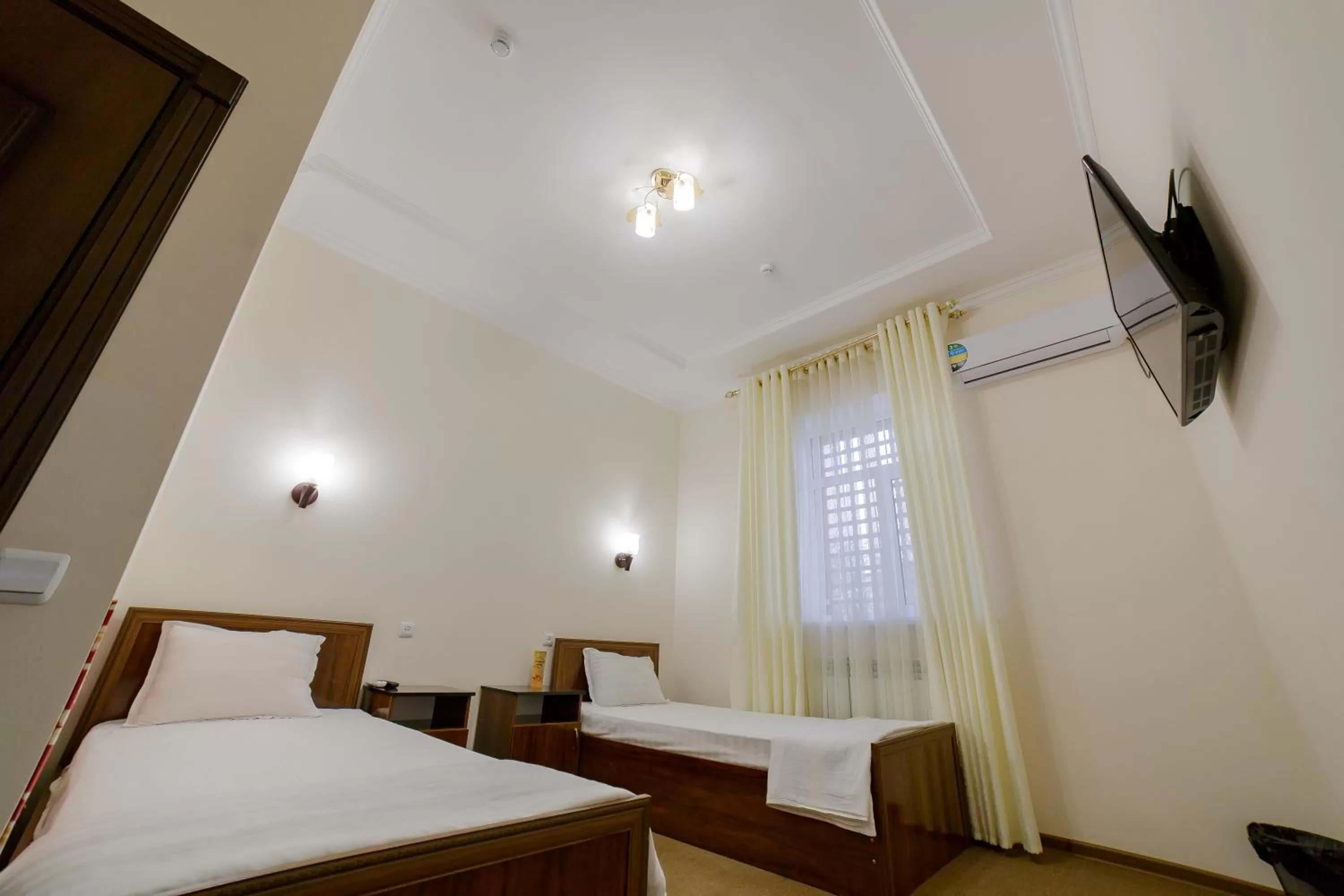 Bed in Caravan Hotel