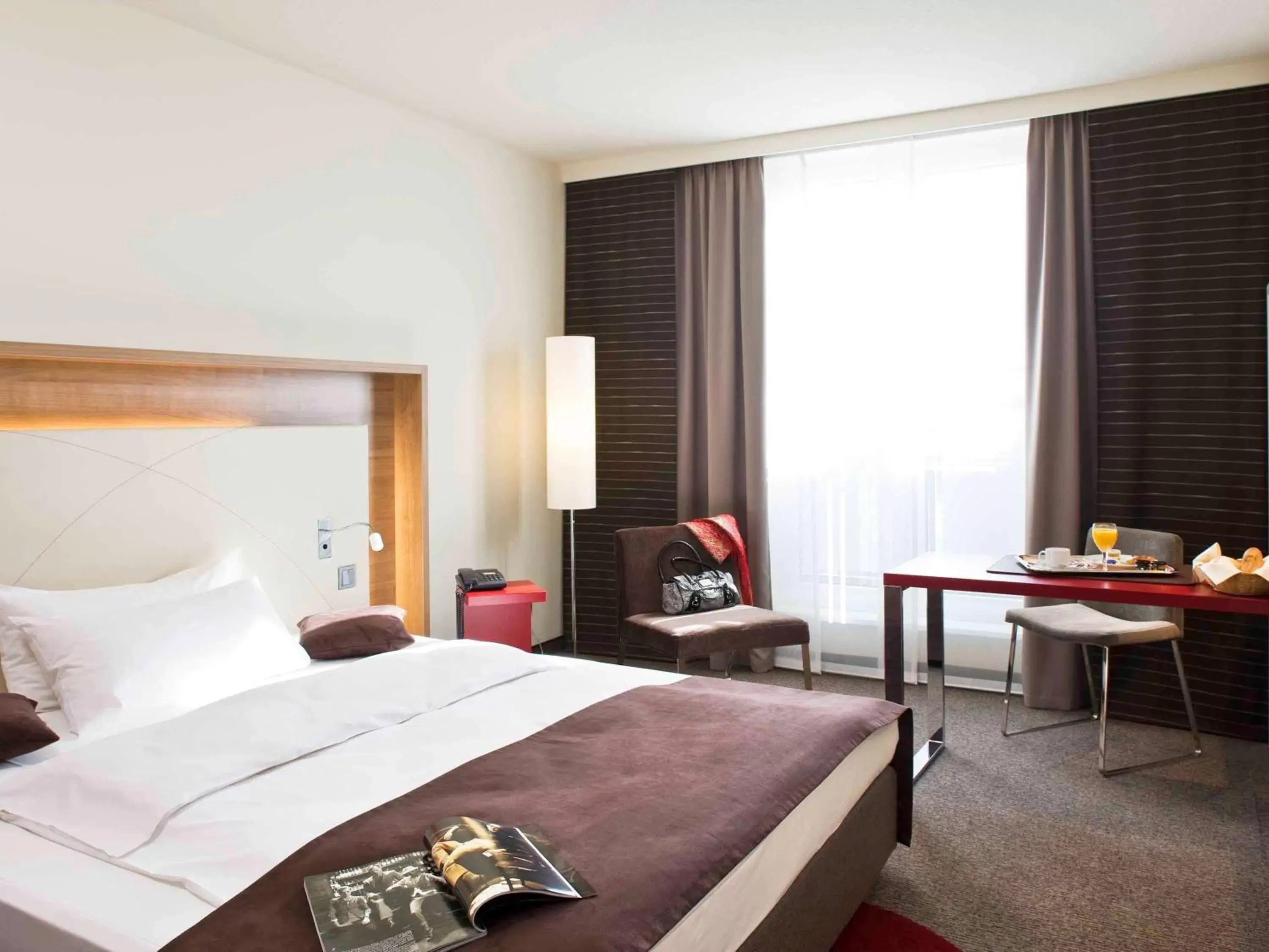 Photo of the whole room, Bed in Mercure Hotel Stuttgart Airport Messe