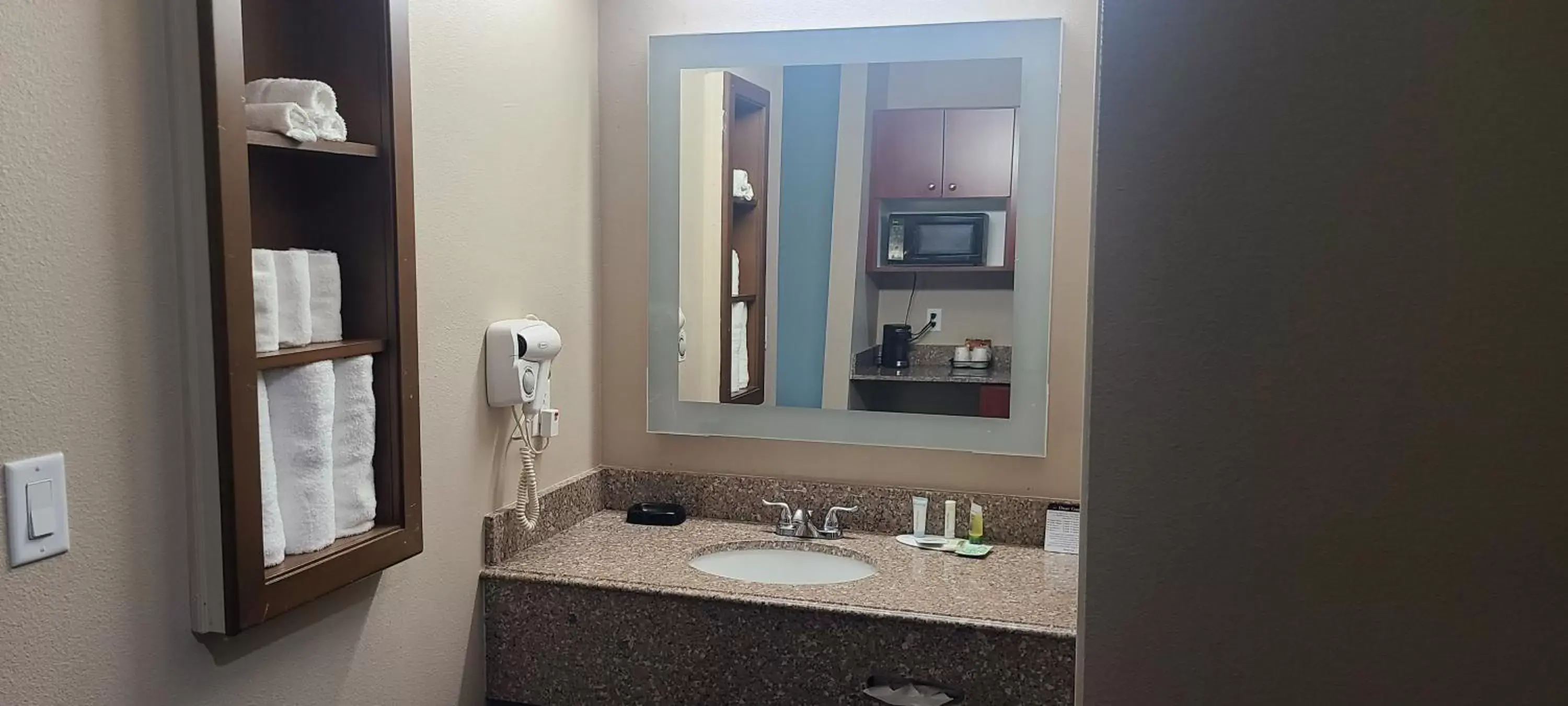 Bathroom in Super 8 by Wyndham Lubbock West