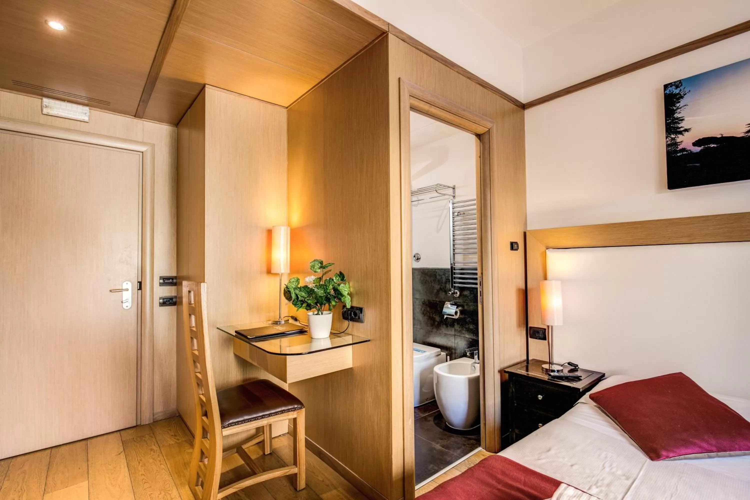 Bed in Ginevra Palace Hotel