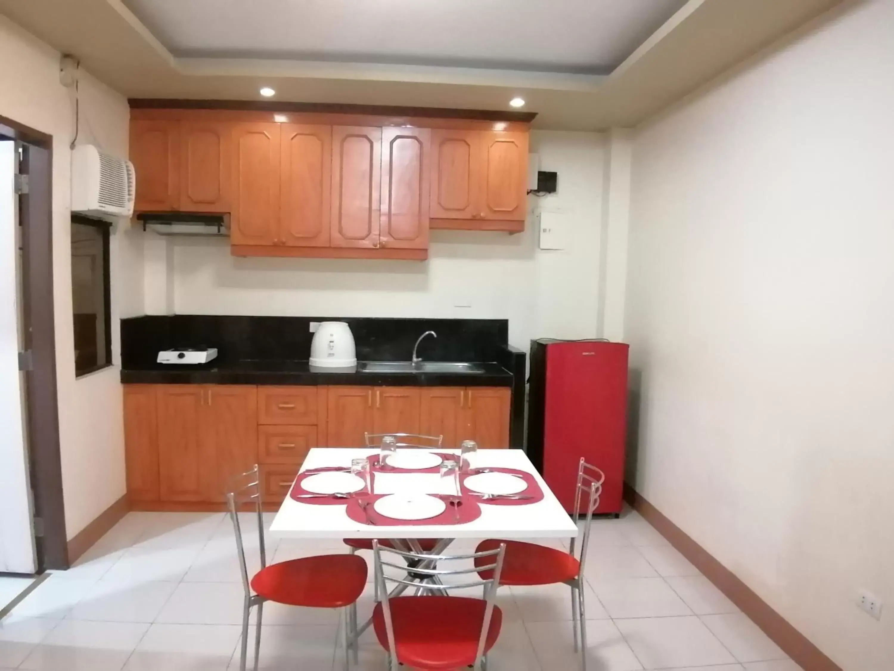 Kitchen or kitchenette, Dining Area in Manora Apartment