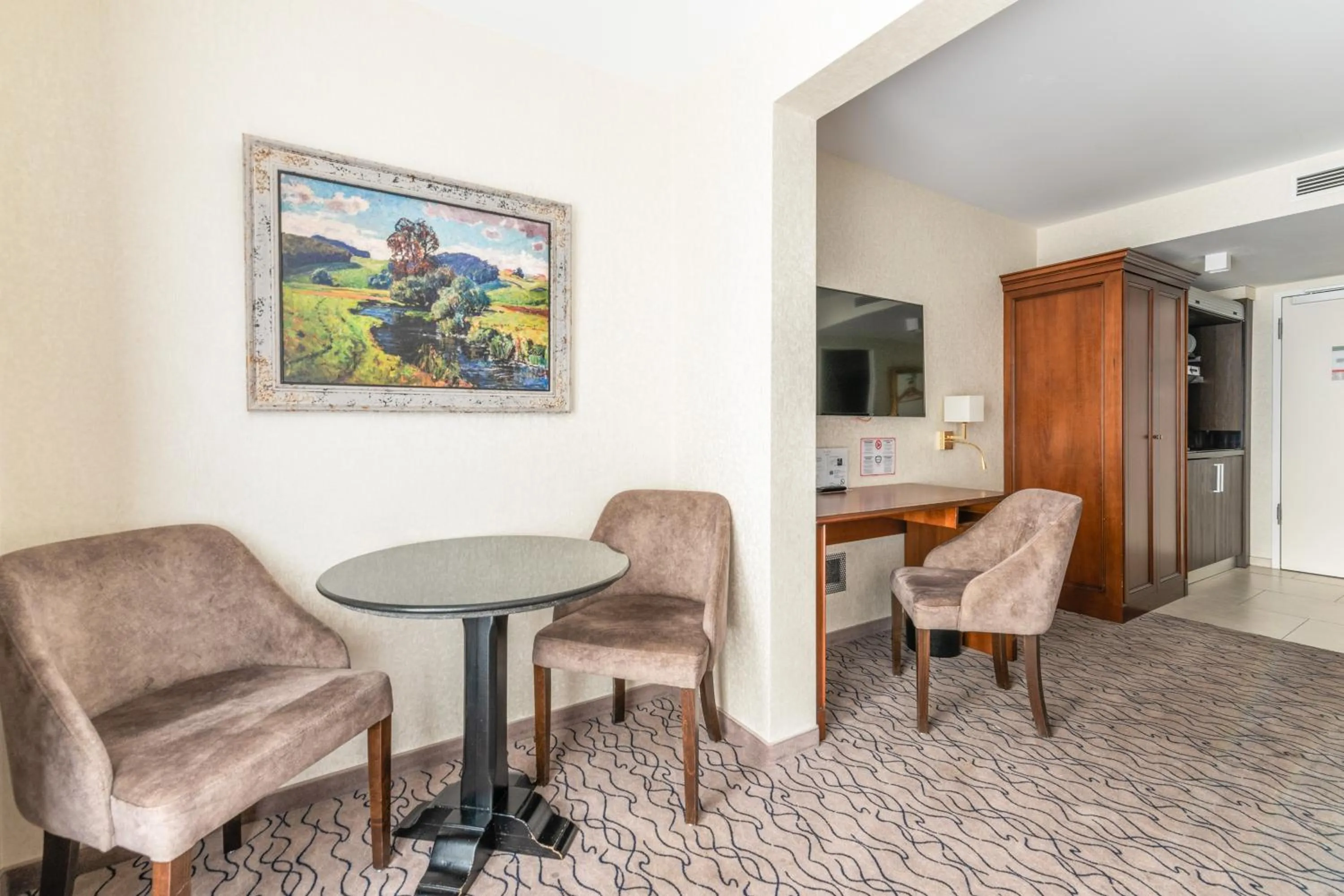 Seating area in AdvaStay by KING's