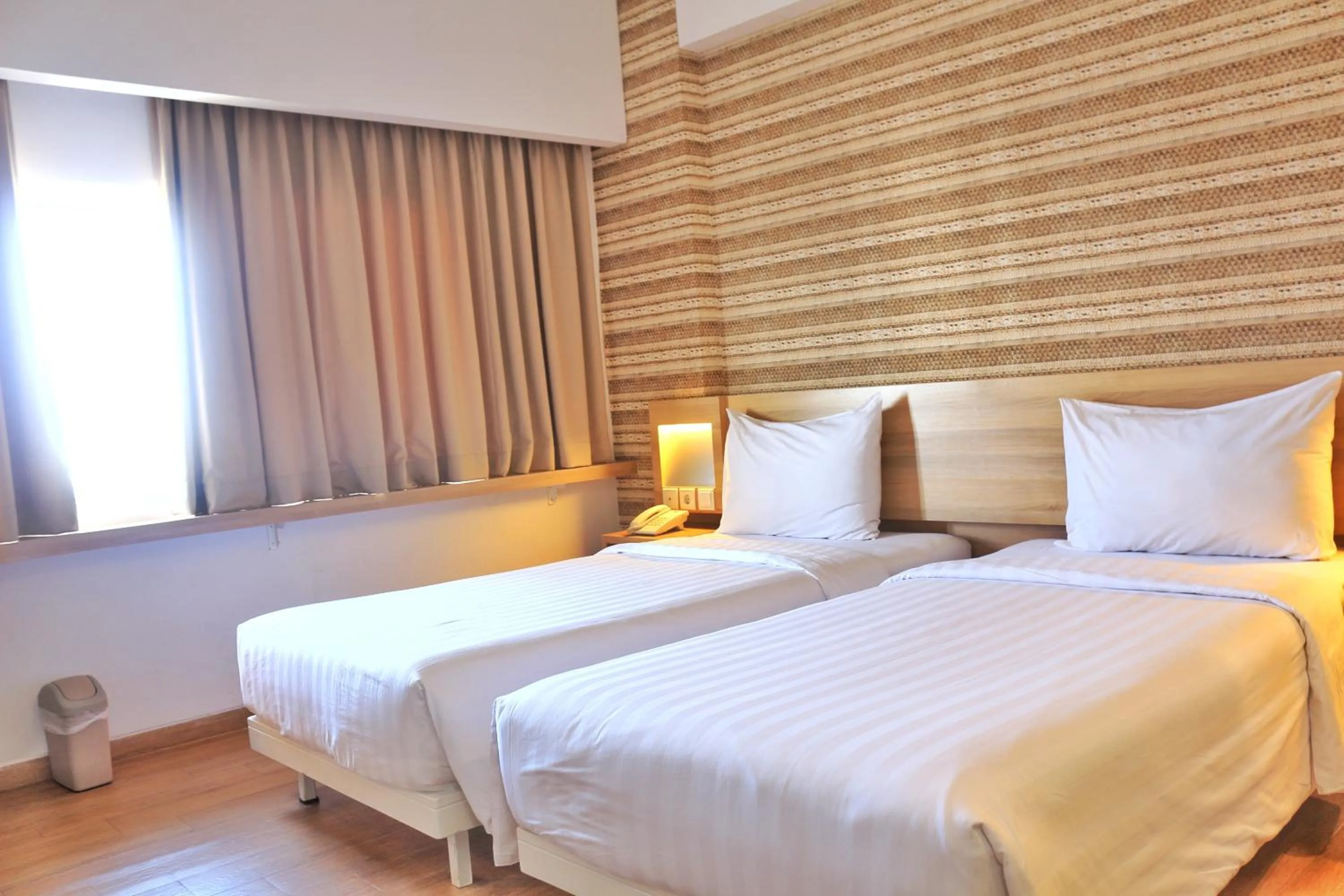 Bed in Whiz Prime Hotel Basuki Rahmat Malang