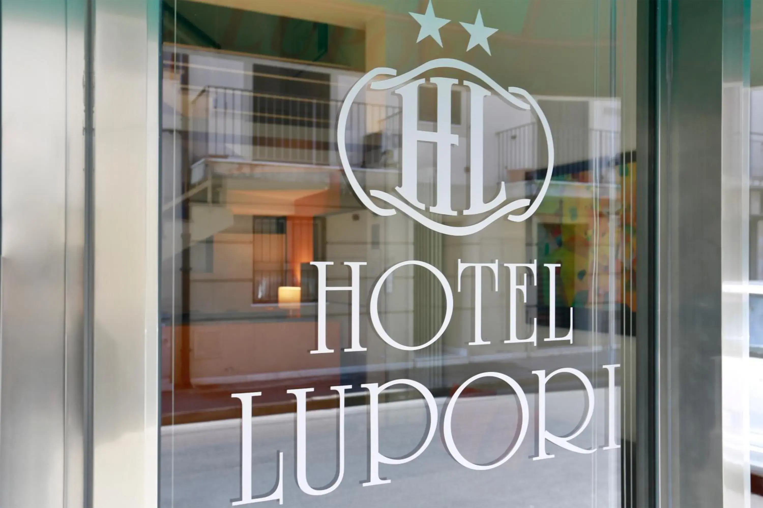 Property logo or sign in Hotel Lupori