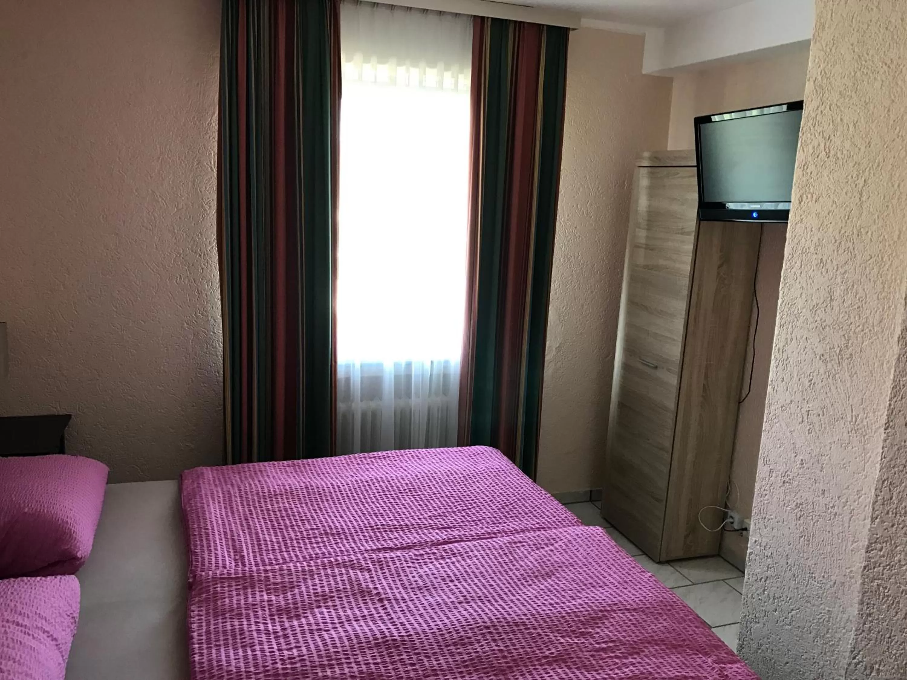 Decorative detail, Bed in Hotel Rhein INN