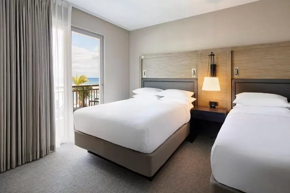 Bed in Embassy Suites St Augustine Beach Oceanfront Resort