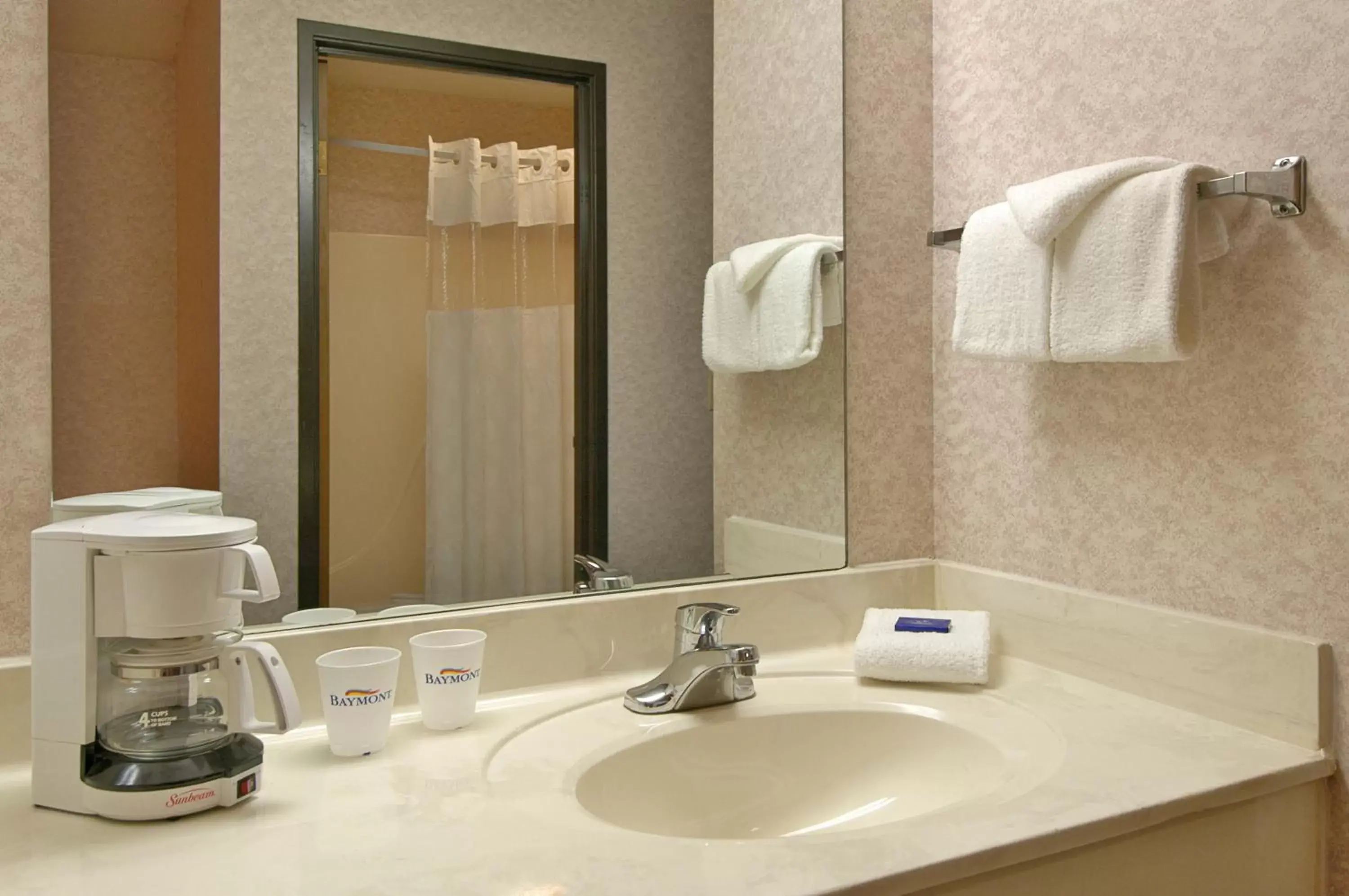 Bathroom in Baymont by Wyndham Muskegon Bathroom in Baymont by Wyndham Muskegon