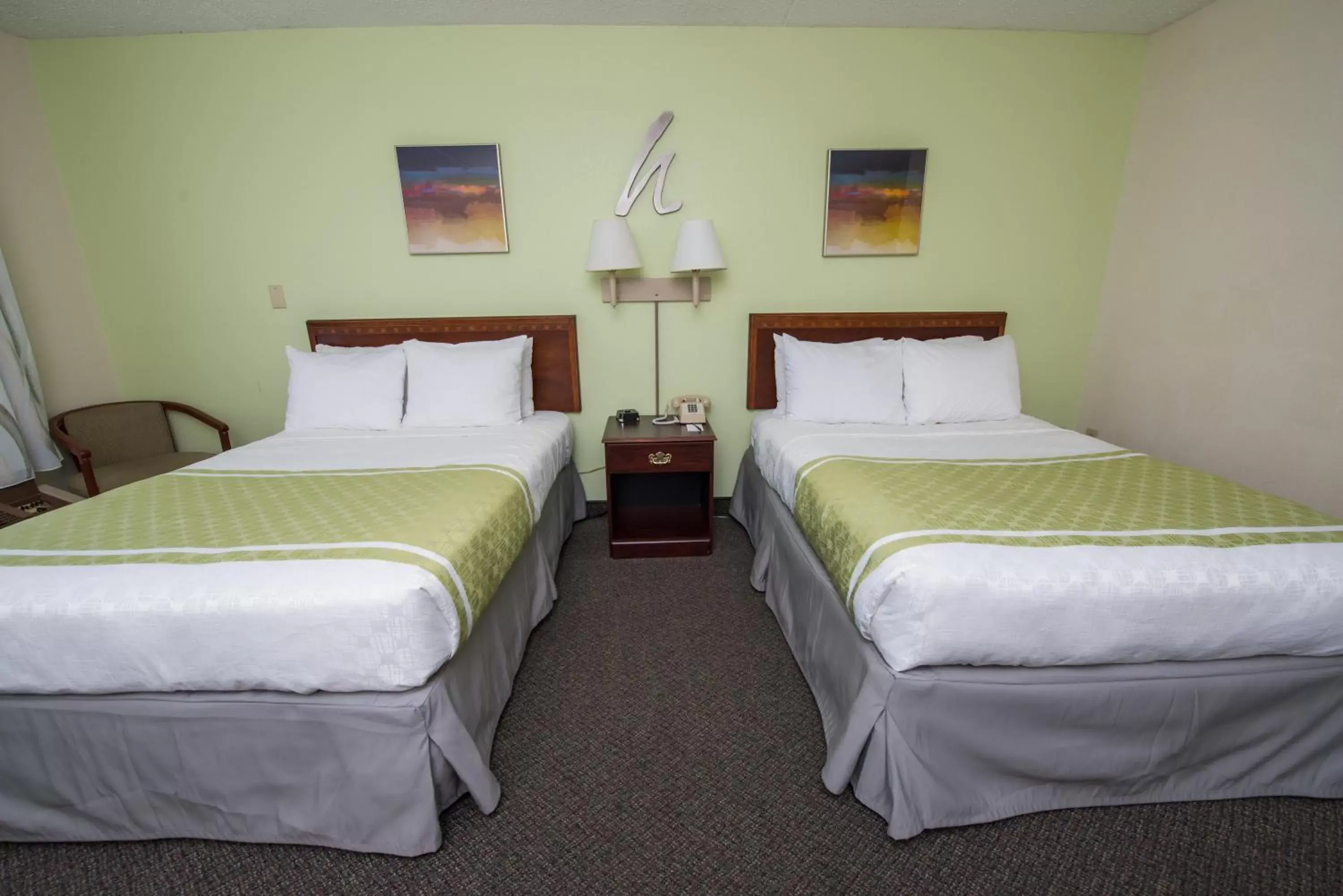 Bed in Hope Hotel and Richard C. Holbrooke Conference Center