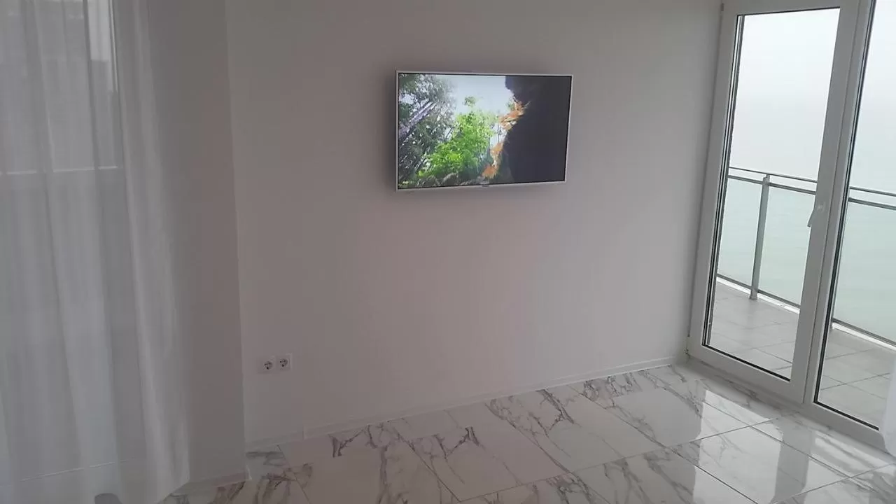 TV and multimedia, TV/Entertainment Center in PURE WELLNESS SEA-VIEW Beluga & Dolphin Luxury HOTEL apartments