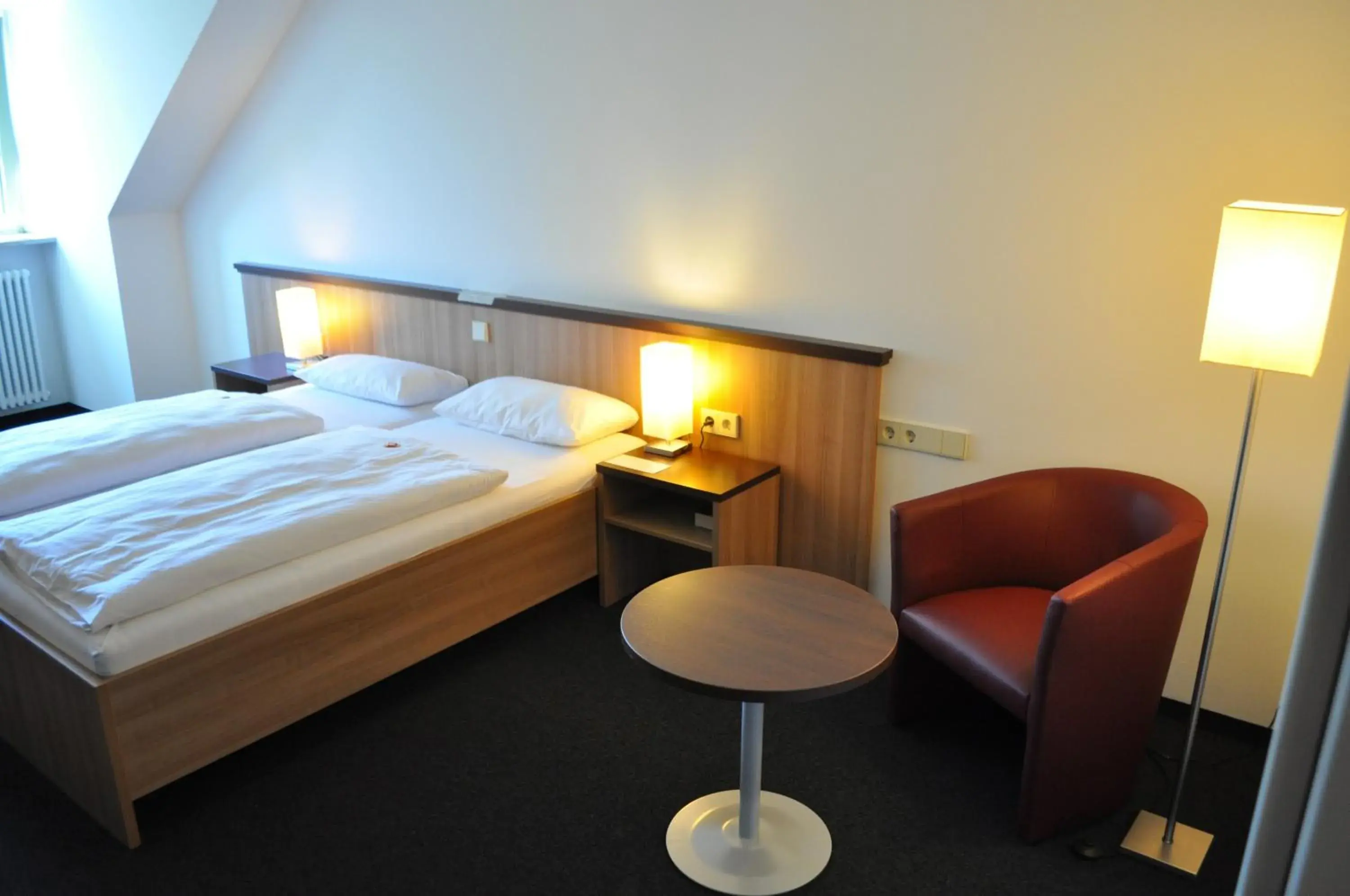 Photo of the whole room, Bed in Christkönigshaus