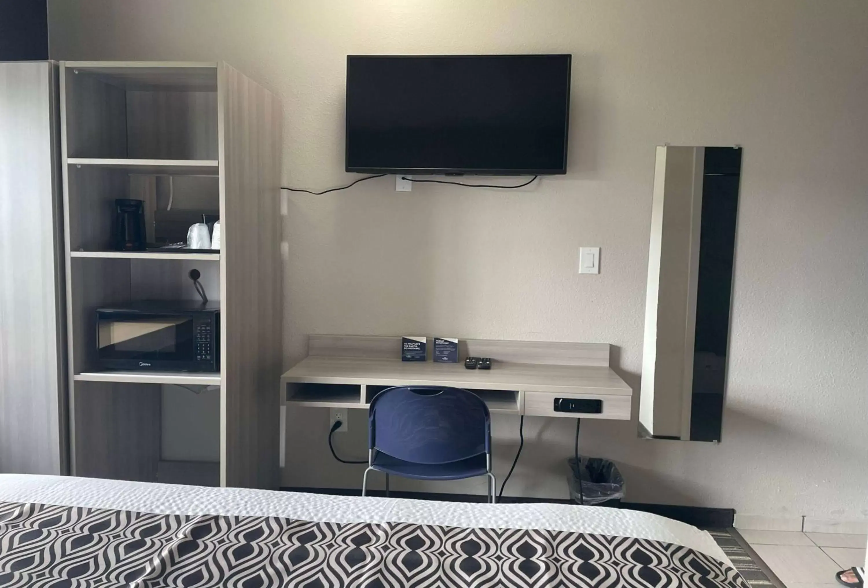 Photo of the whole room, TV/Entertainment Center in Microtel Inn & Suites by Wyndham Bossier City