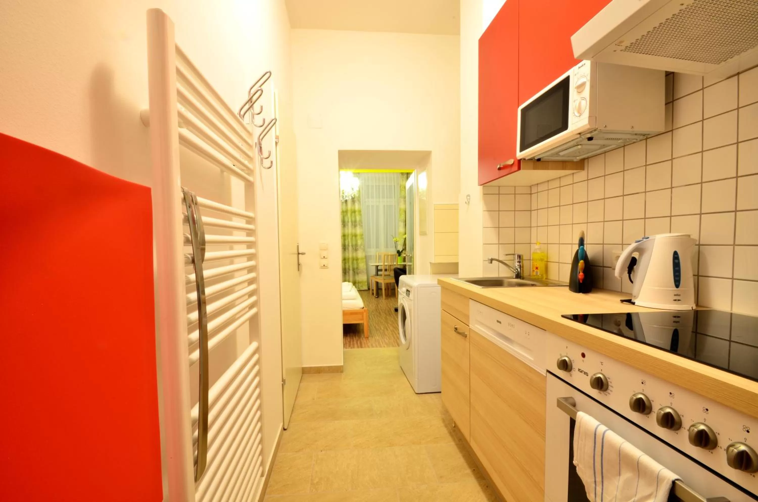 Kitchen or kitchenette in AJO Apartments - Messe City Flat - Self-Check-in