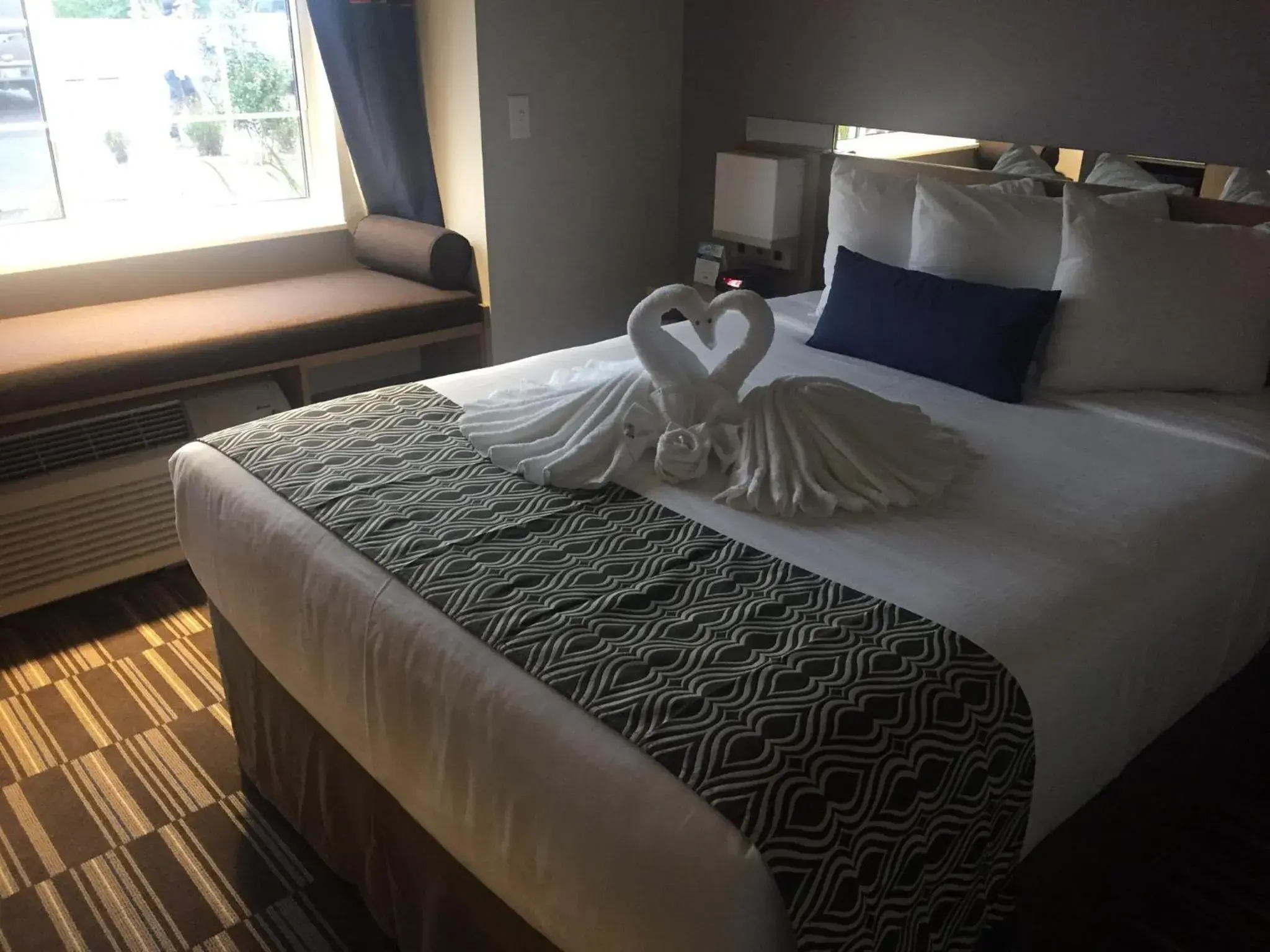 Bed in Microtel Inn & Suites by Wyndham Ocean City