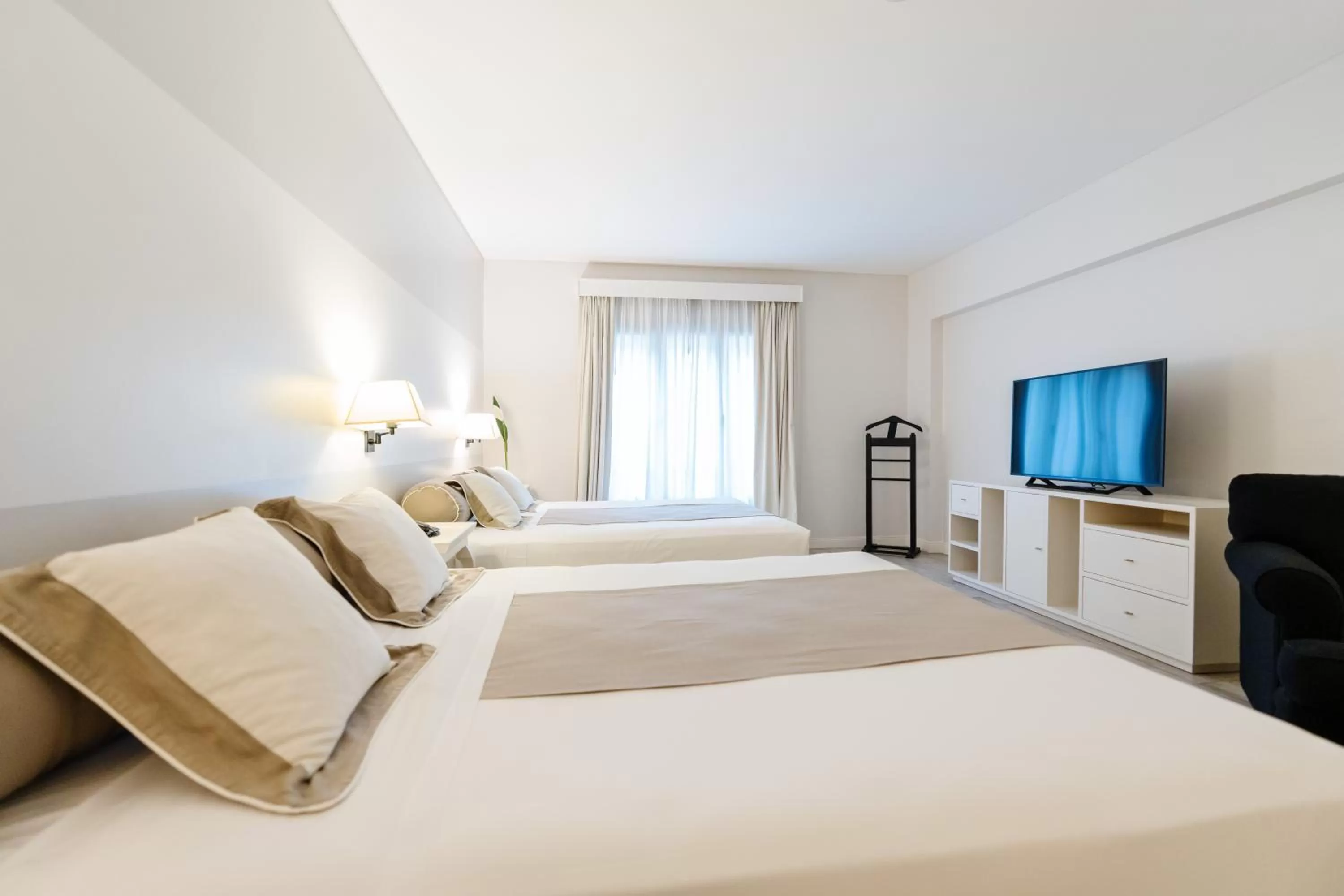 Bed in Loi Suites Recoleta Hotel