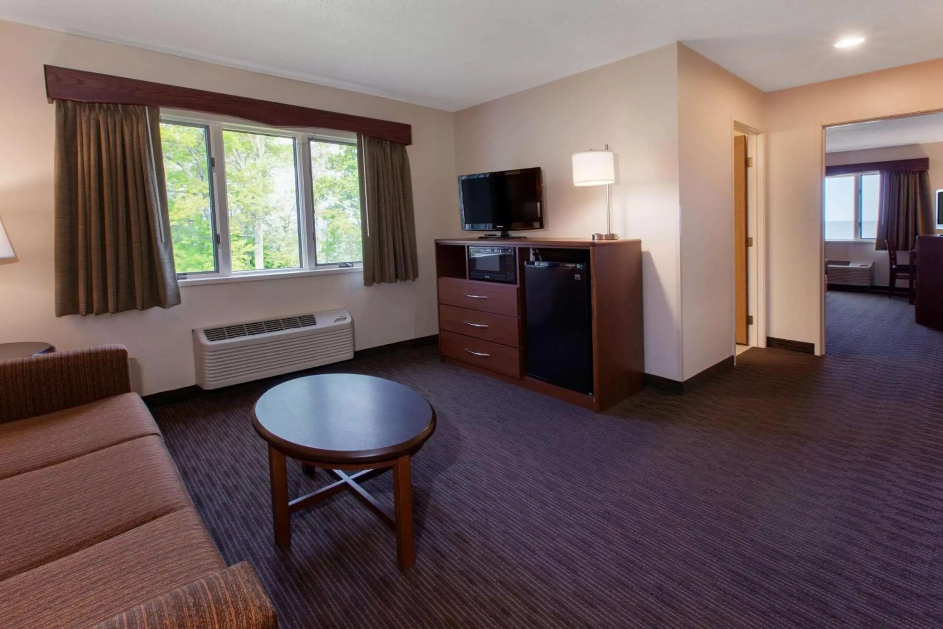 Photo of the whole room, TV/Entertainment Center in AmericInn by Wyndham Silver City