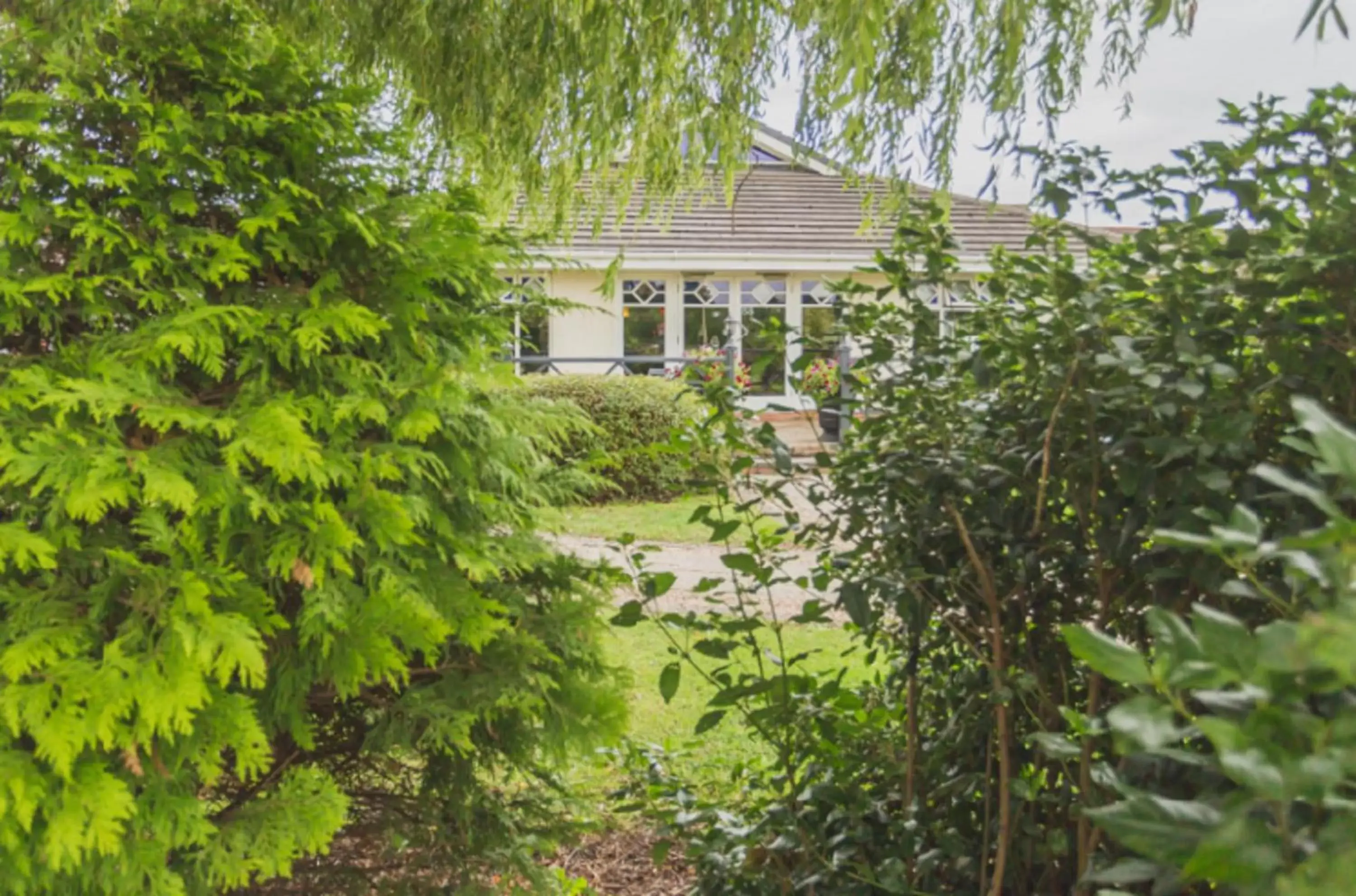 Garden view, Property Building in Holt Lodge Hotel