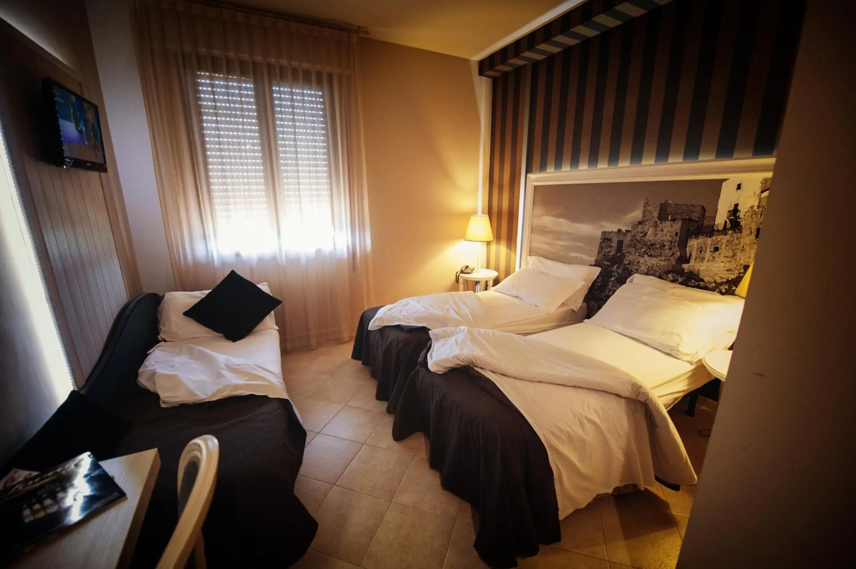 Bed in Gran Paradiso Hotel Spa