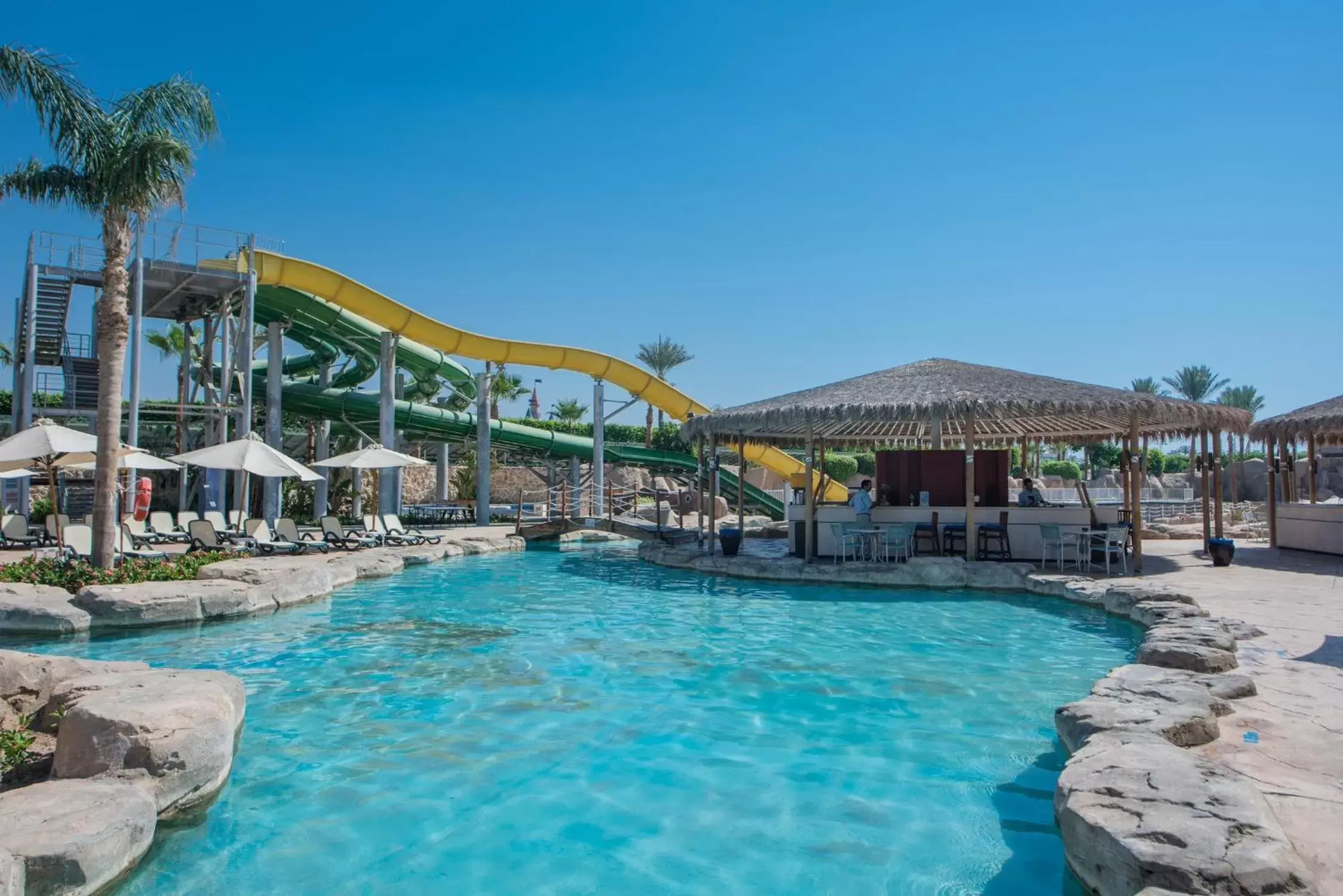 Swimming pool, Property Building in Reef Oasis Beach Aqua Park Resort