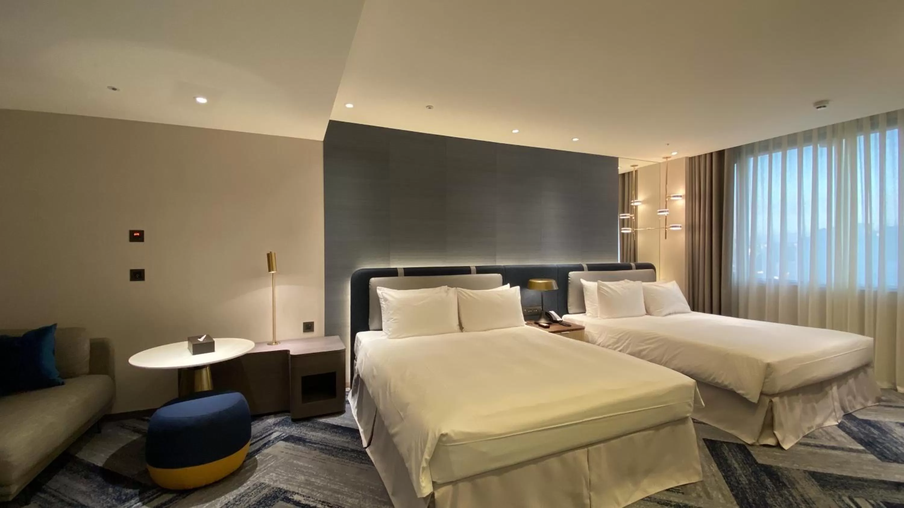 Bed in Monarch Plaza Hotel