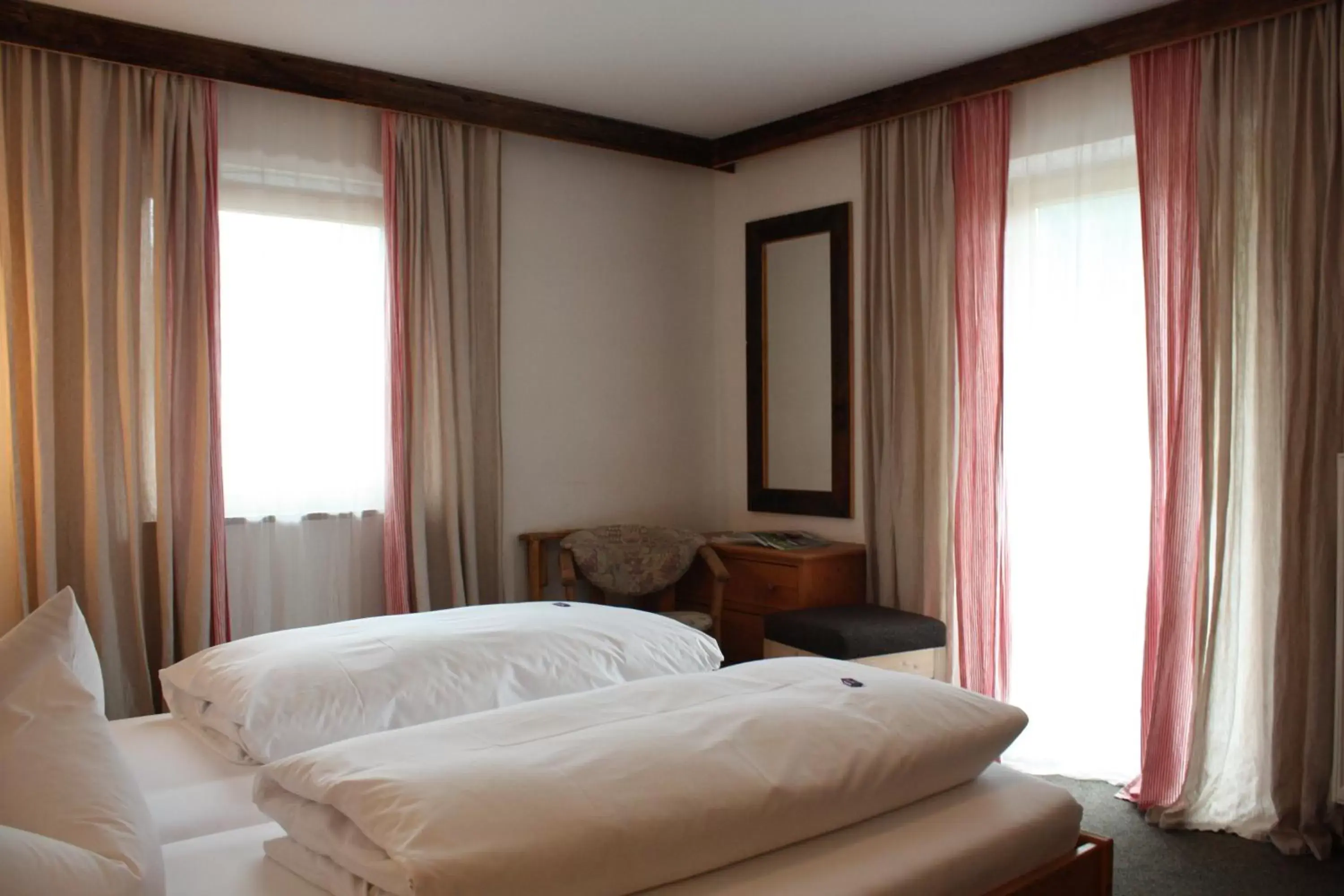 Bed in Das Posch Hotel