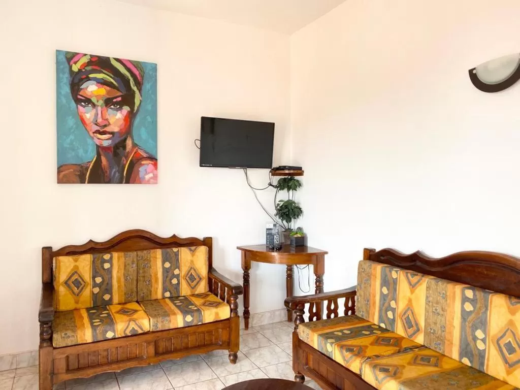 TV and multimedia, Seating Area in Suites Ximajo