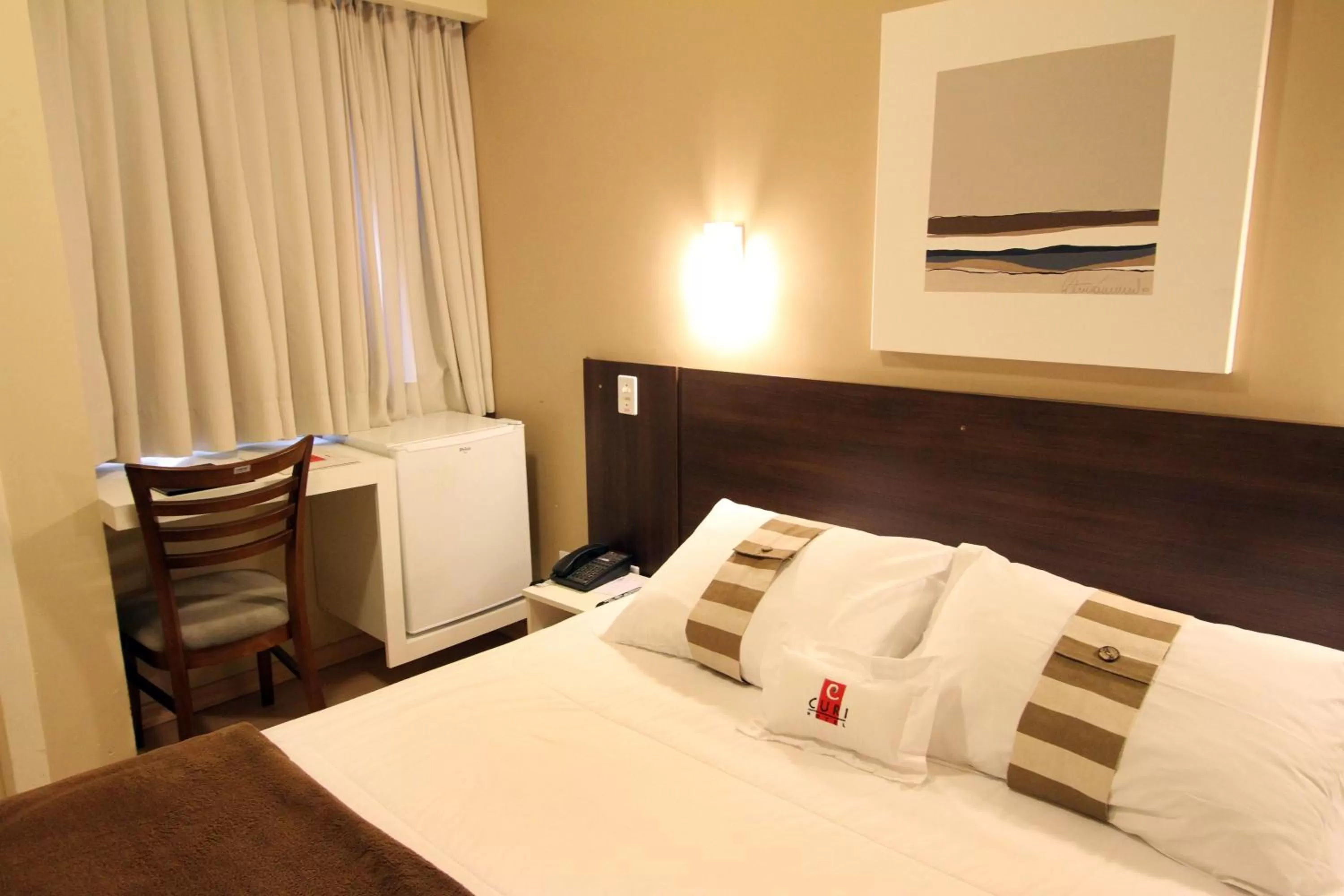 Bed in Hotel Curi Executive