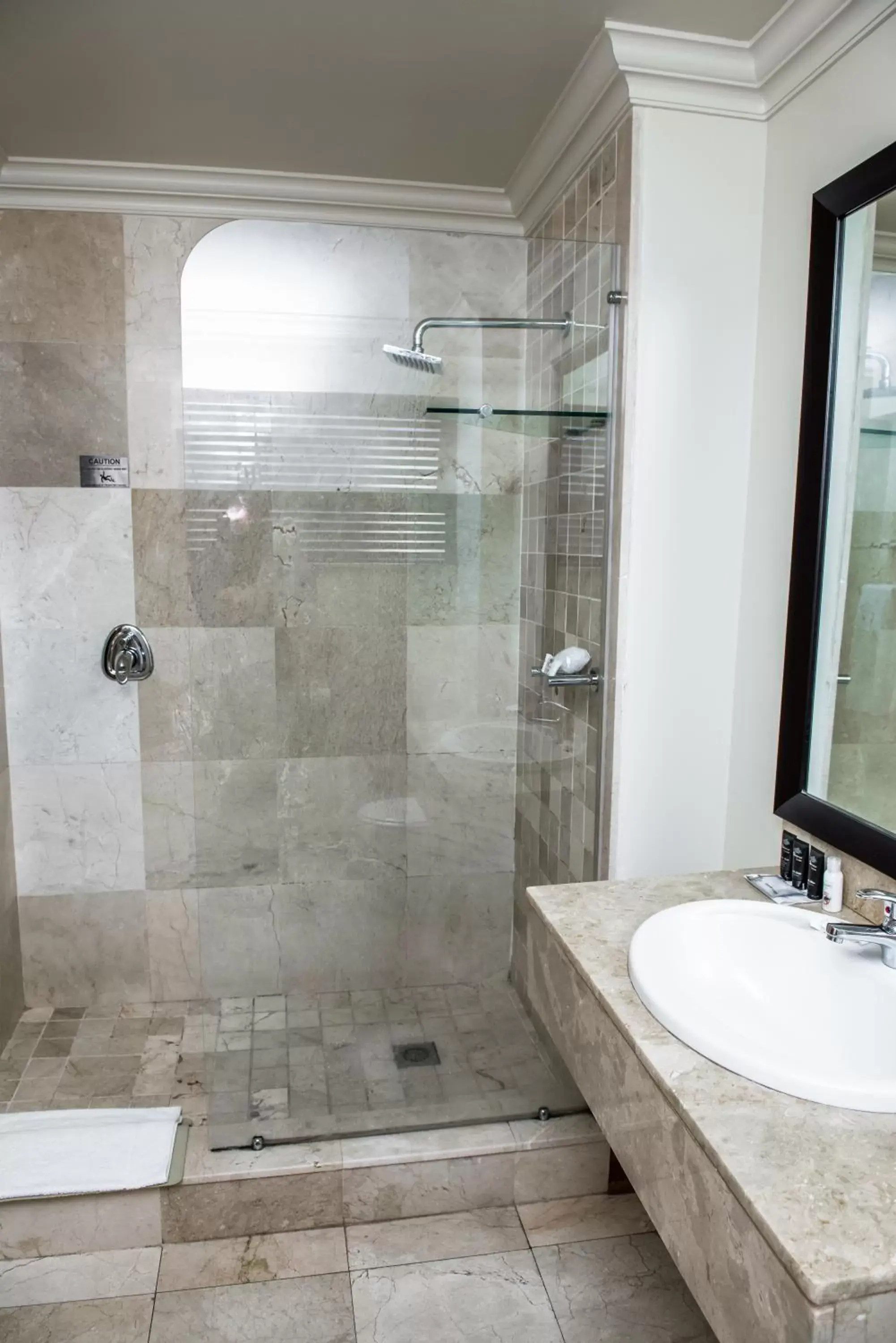 Bathroom in Belaire Suites Hotel