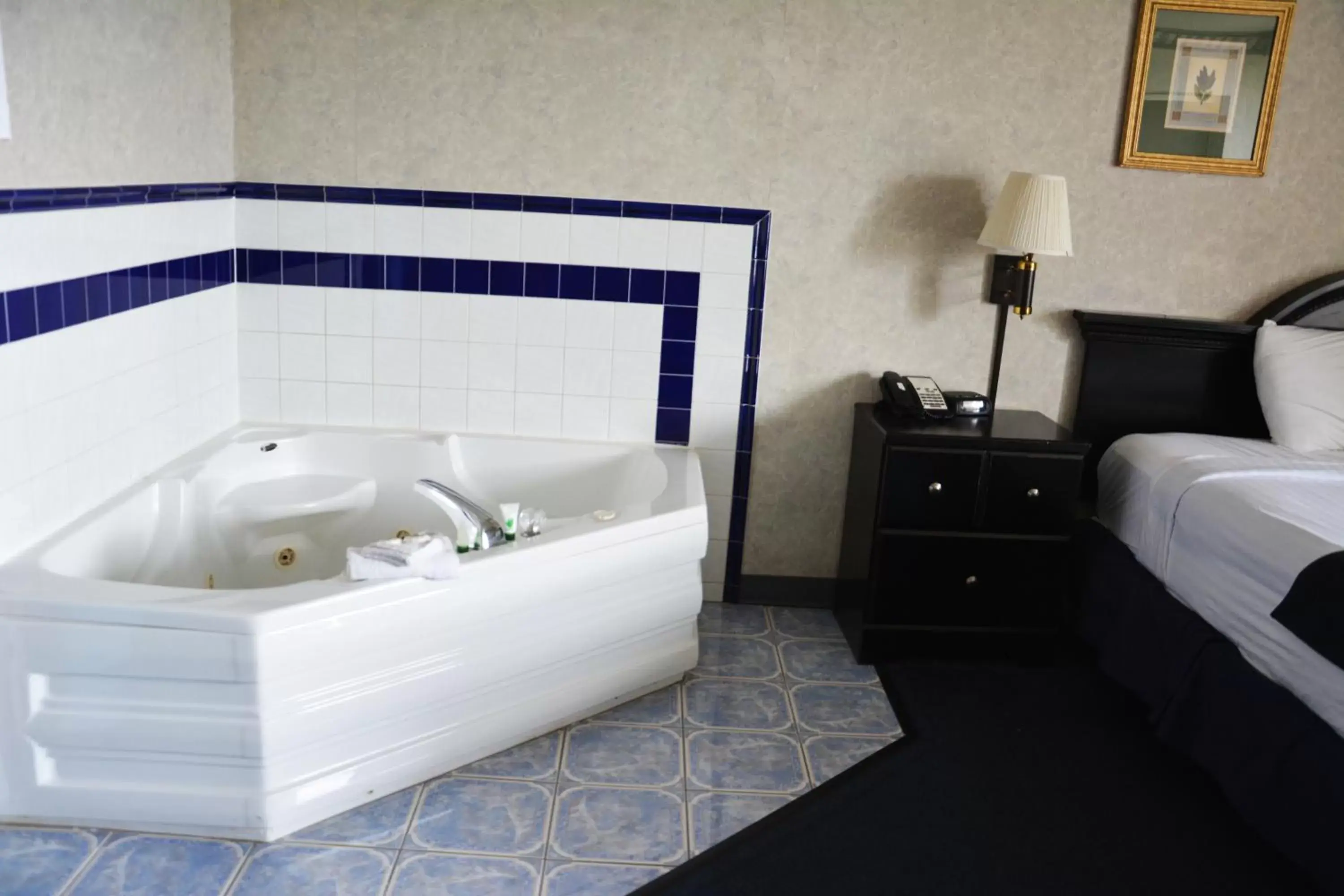 Bed, Bathroom in Travelodge by Wyndham Milwaukee