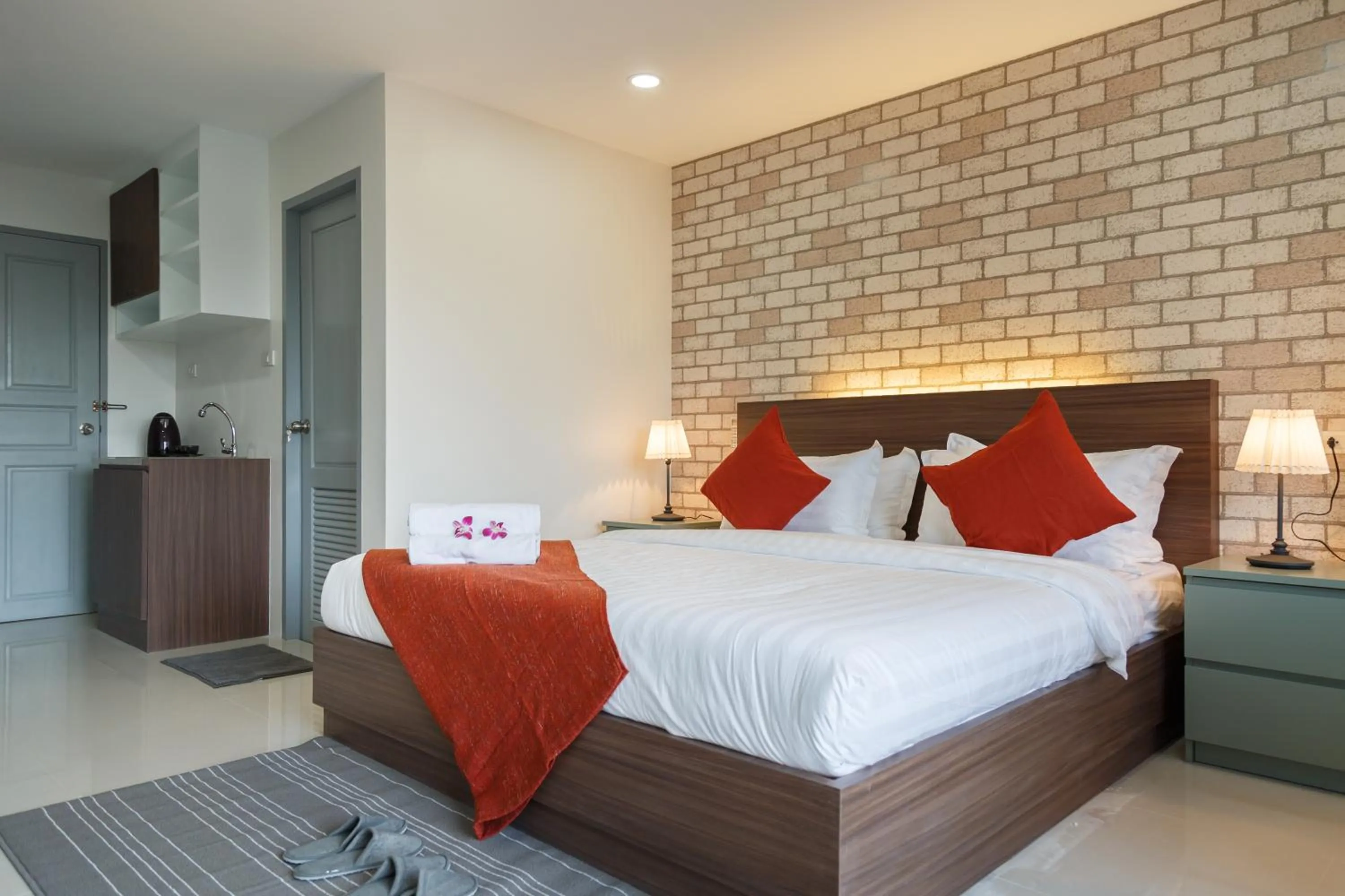 Bed in Q Space Residence