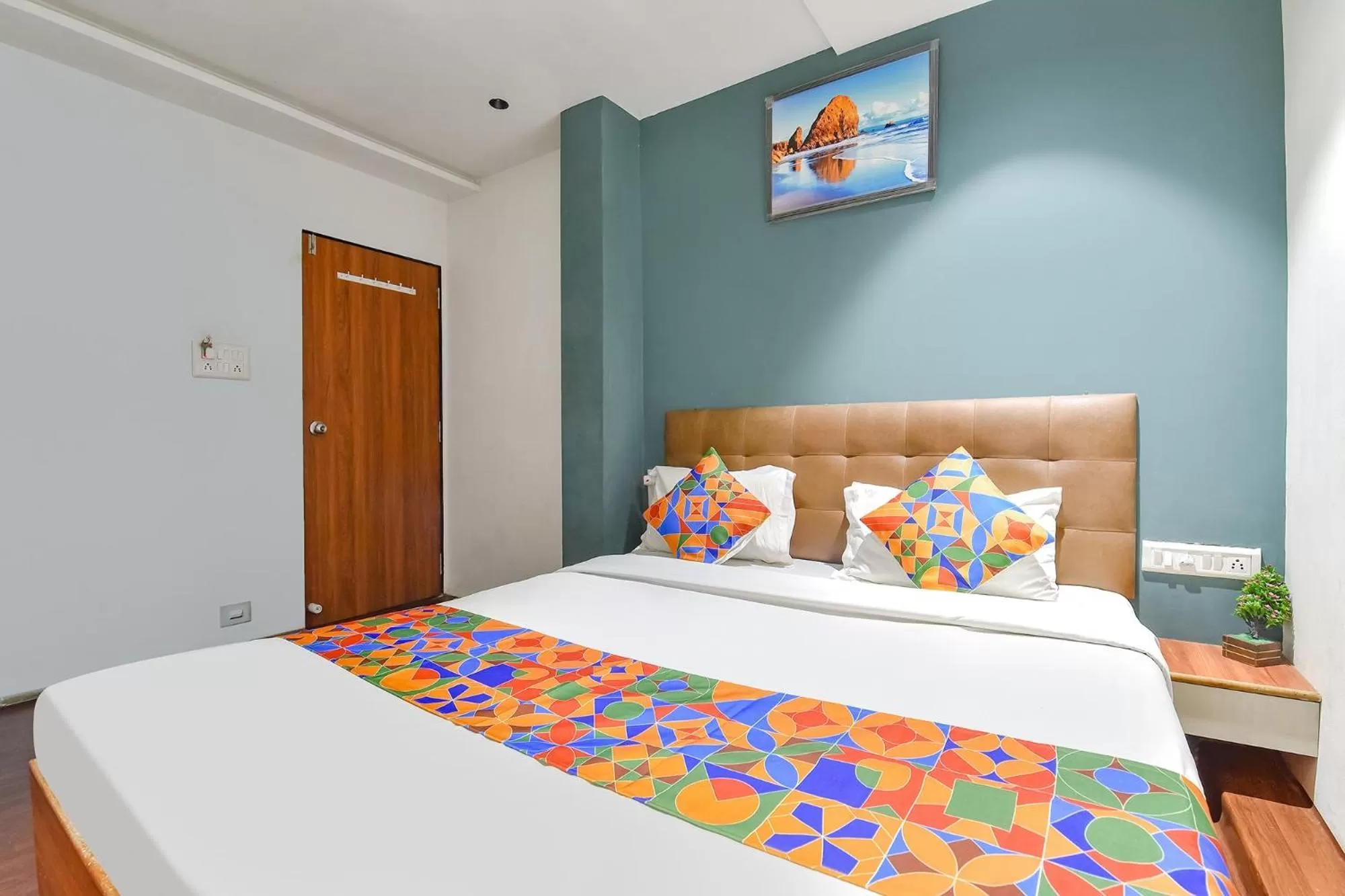 Bed in FabHotel Nidhivan, Udhna Junction