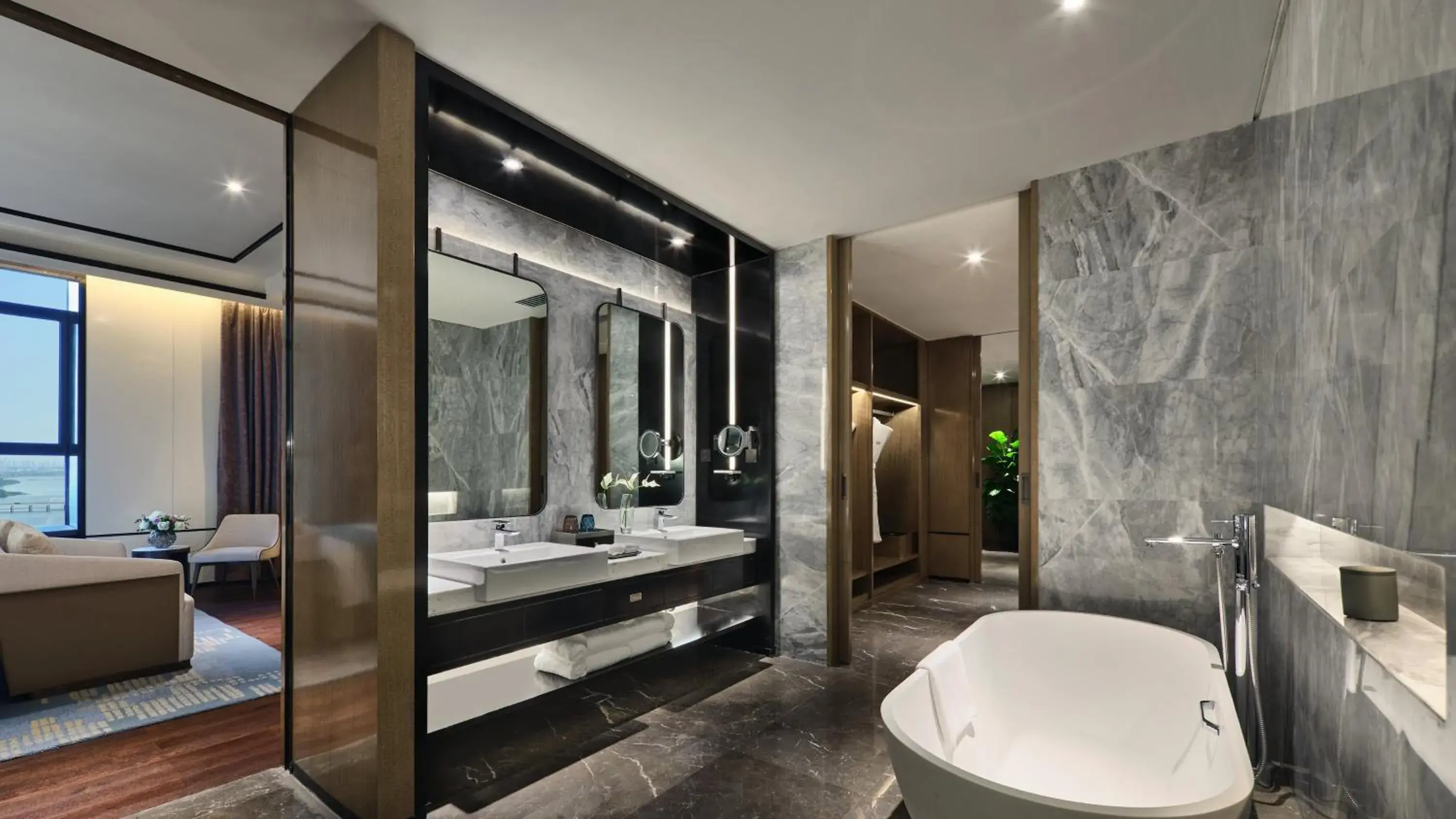 Bedroom, Bathroom in Crowne Plaza Wuhan Development Zone, an IHG Hotel