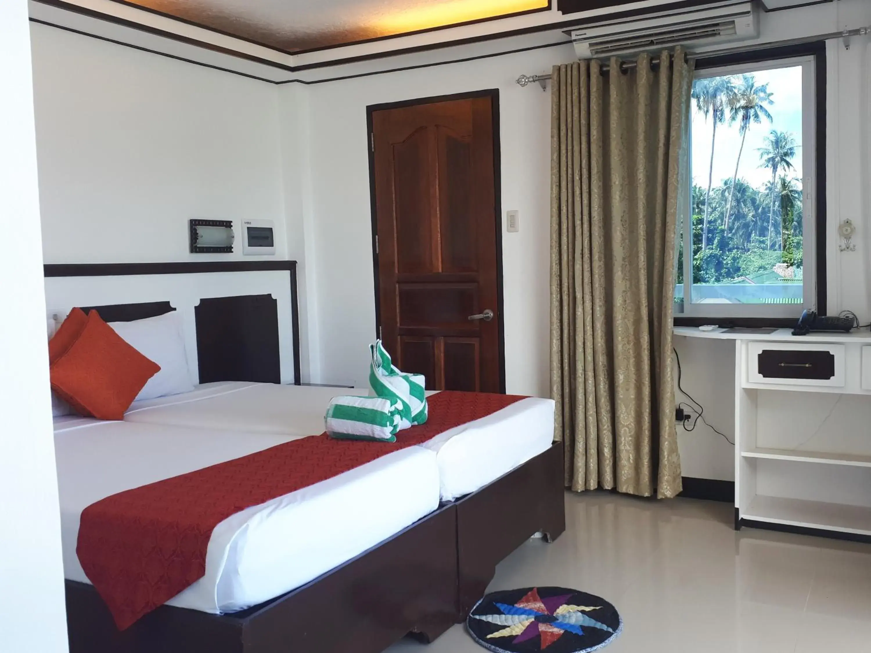 Bed in Orange Pearl Beach Resort Bed in Orange Pearl Beach Resort