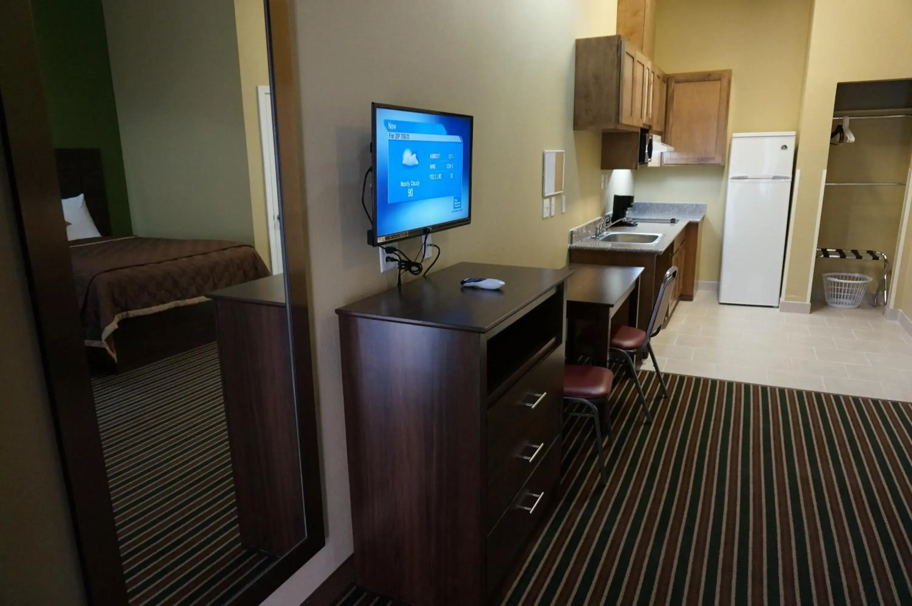 TV and multimedia, TV/Entertainment Center in The Bungalows Hotel & Event Center at Lakeline Austin / Cedar Park