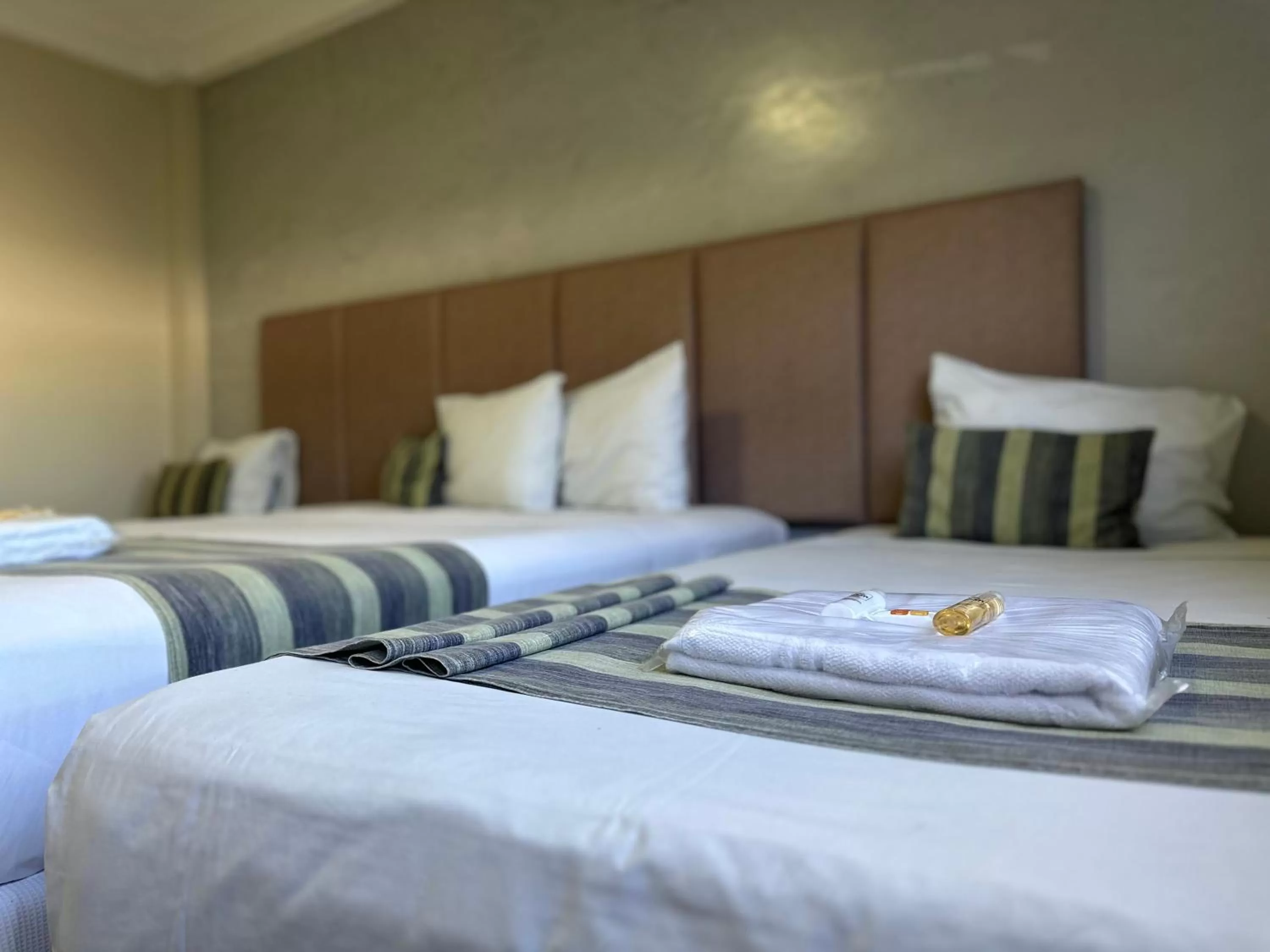 Bed in Atrium Confort Hotels