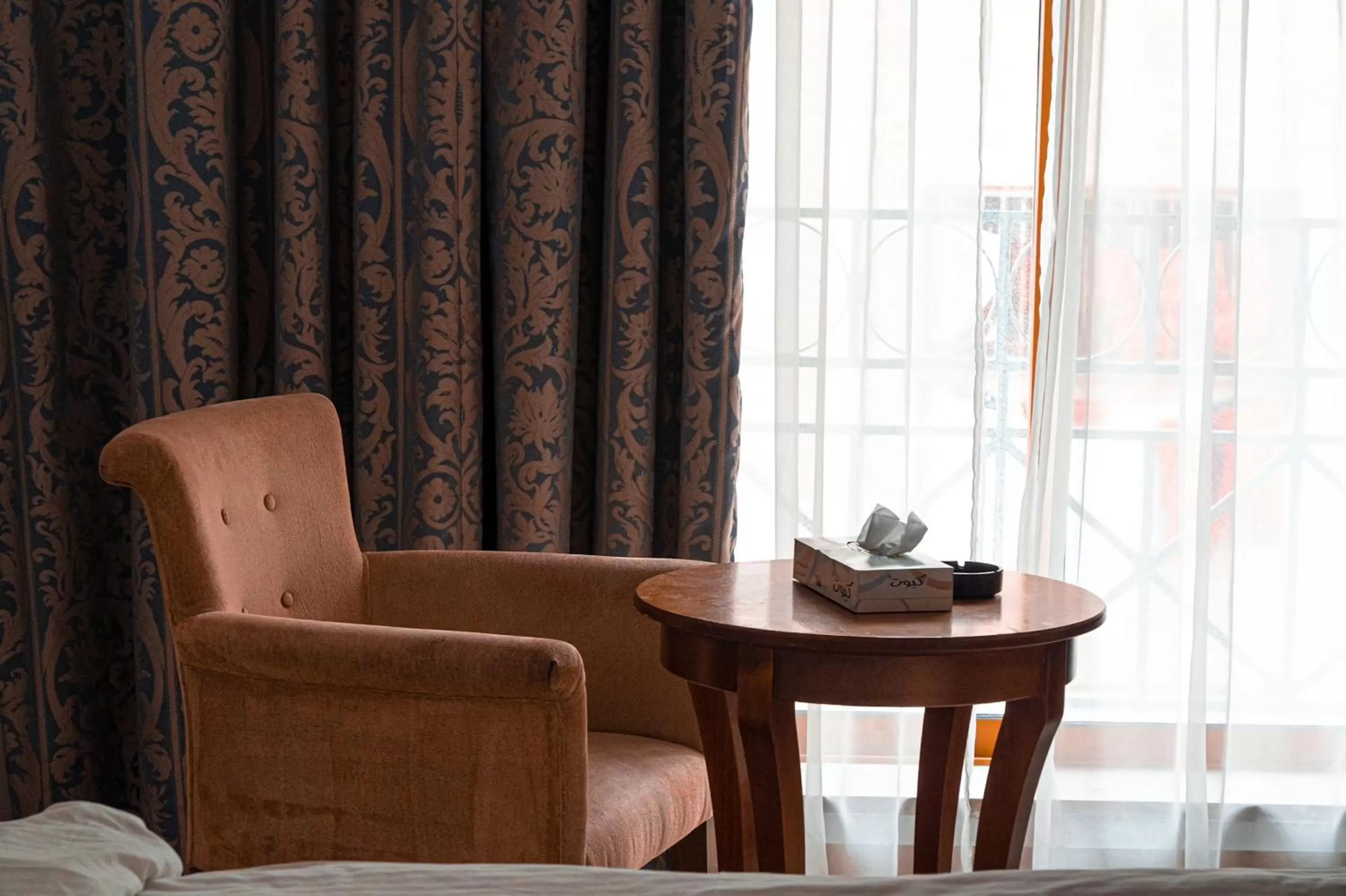 Seating area in Guest House Hotel Amman by FHM