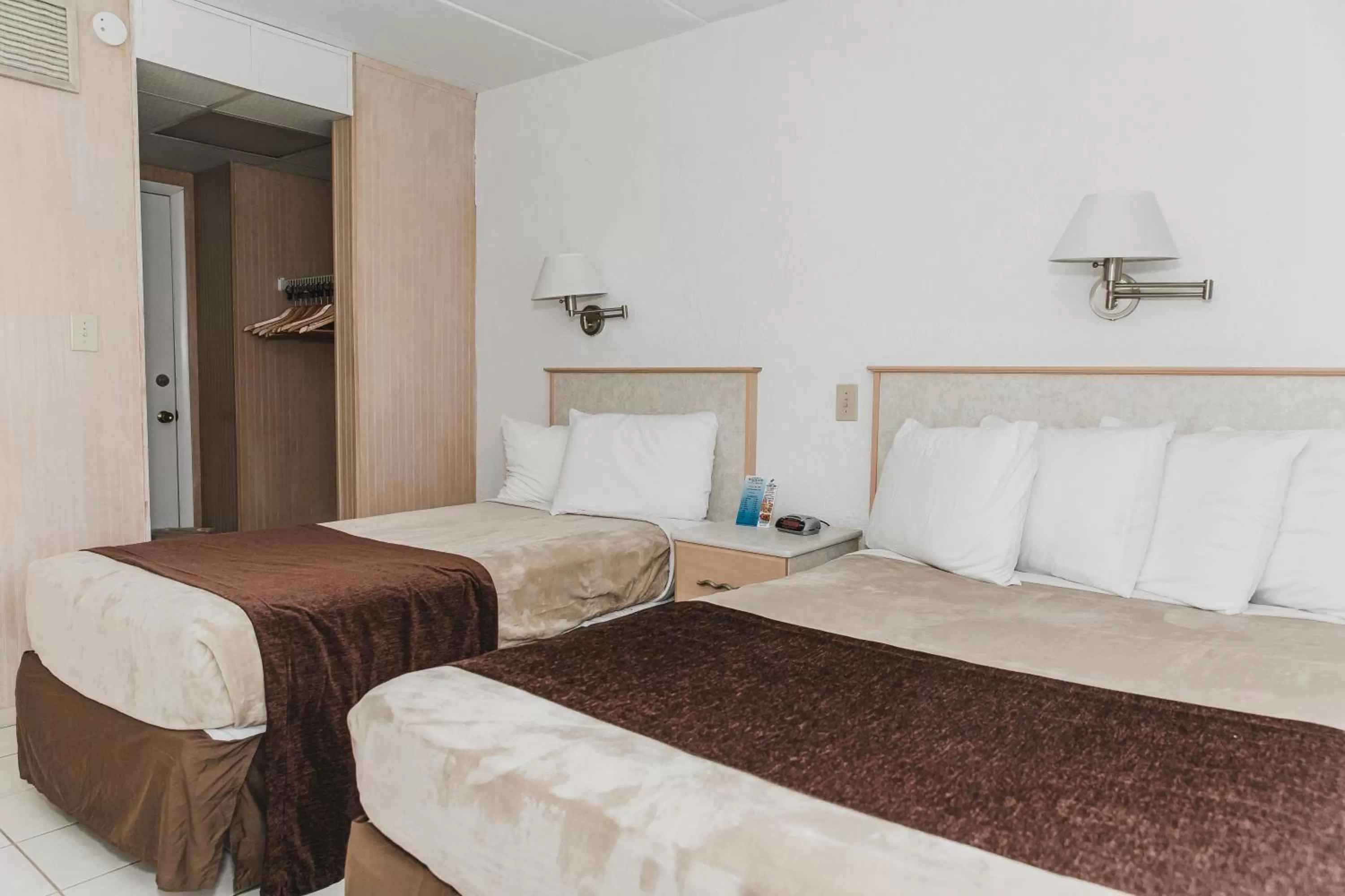 Bed in Heart of Wildwood Boardwalk Motel