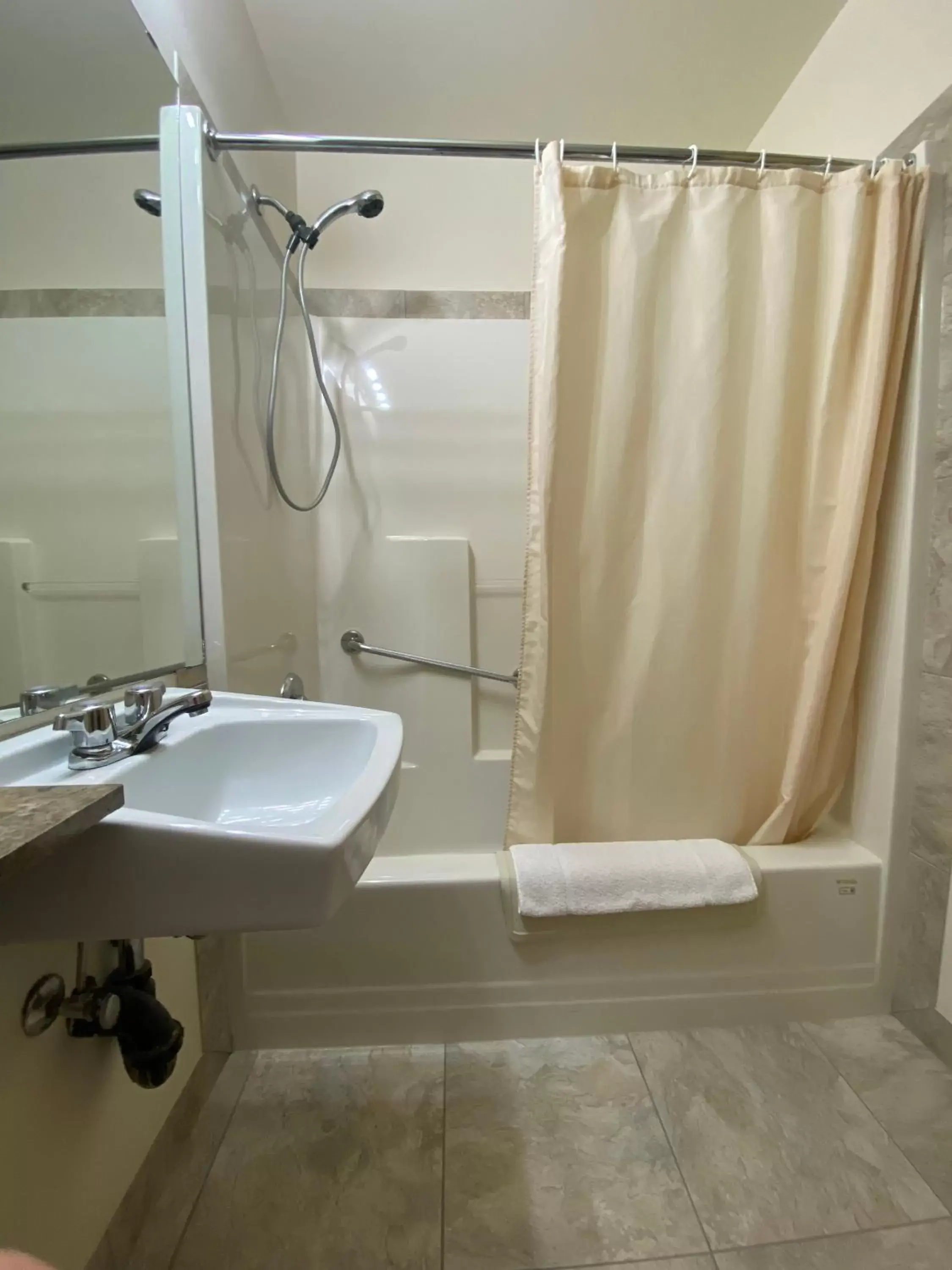 Shower, Bathroom in Sleep Suite Motel