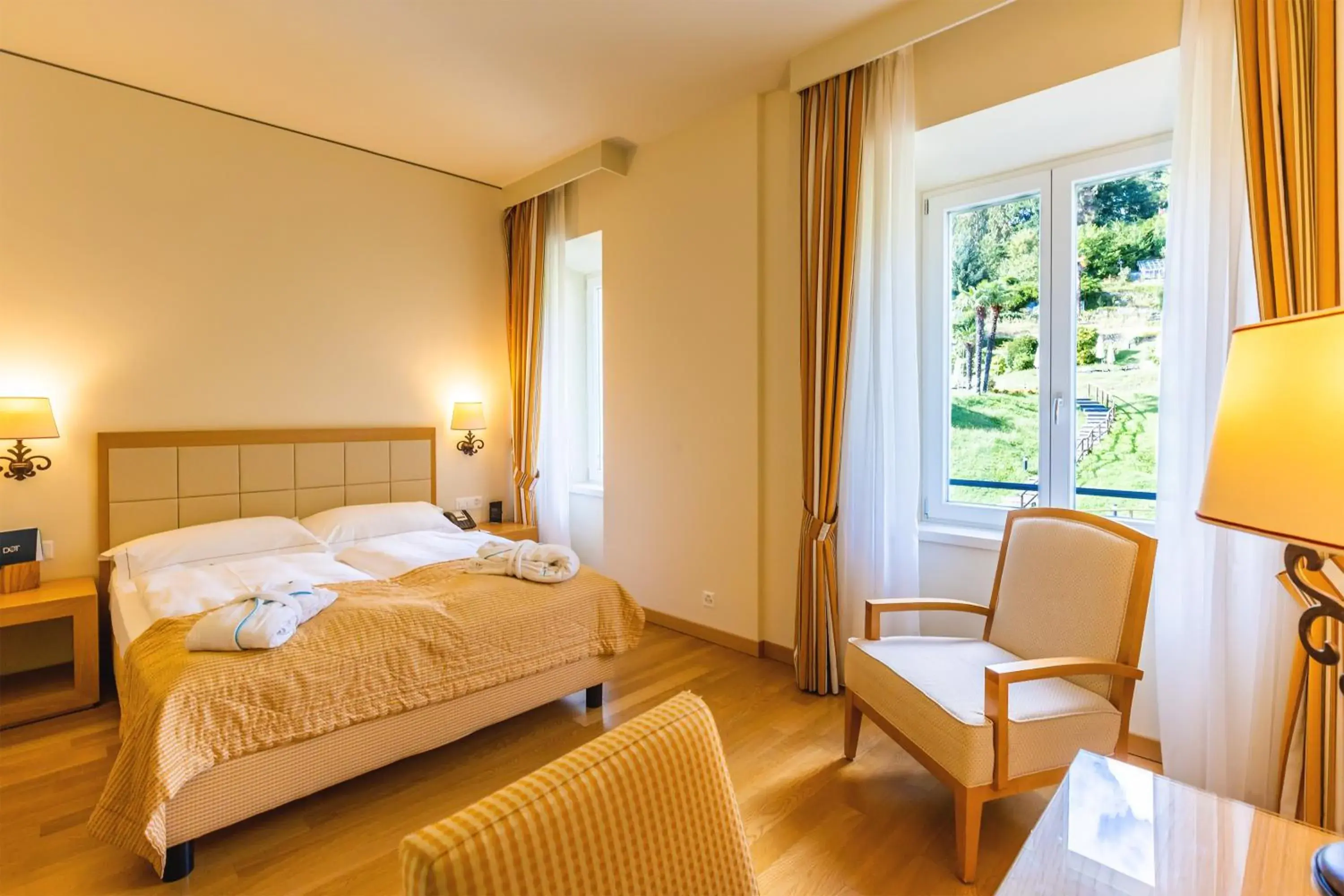 Bedroom, Bed in Kurhaus Cademario Hotel & DOT Spa - Ticino Hotels Group