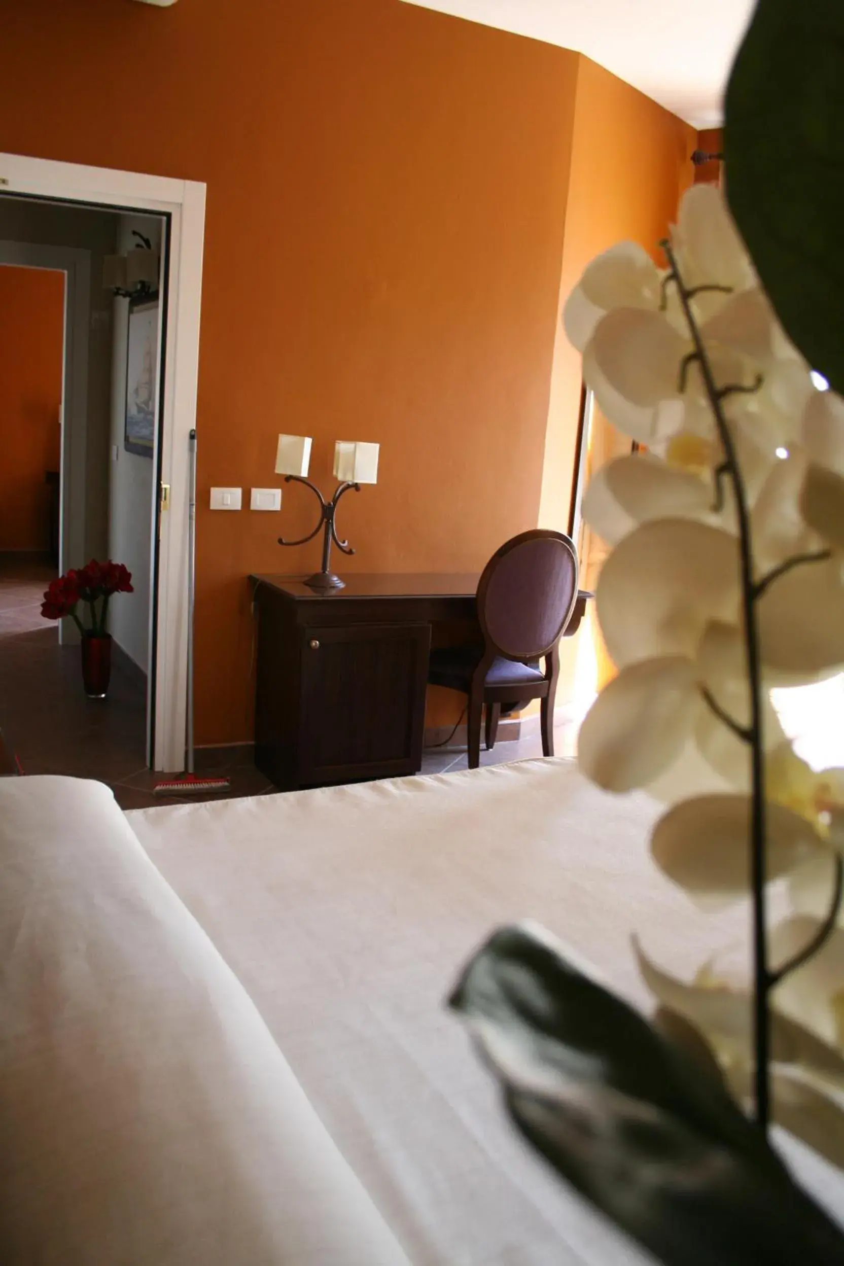 Photo of the whole room, Bed in Hotel dei Coloniali Photo of the whole room, Bed in Hotel dei Coloniali