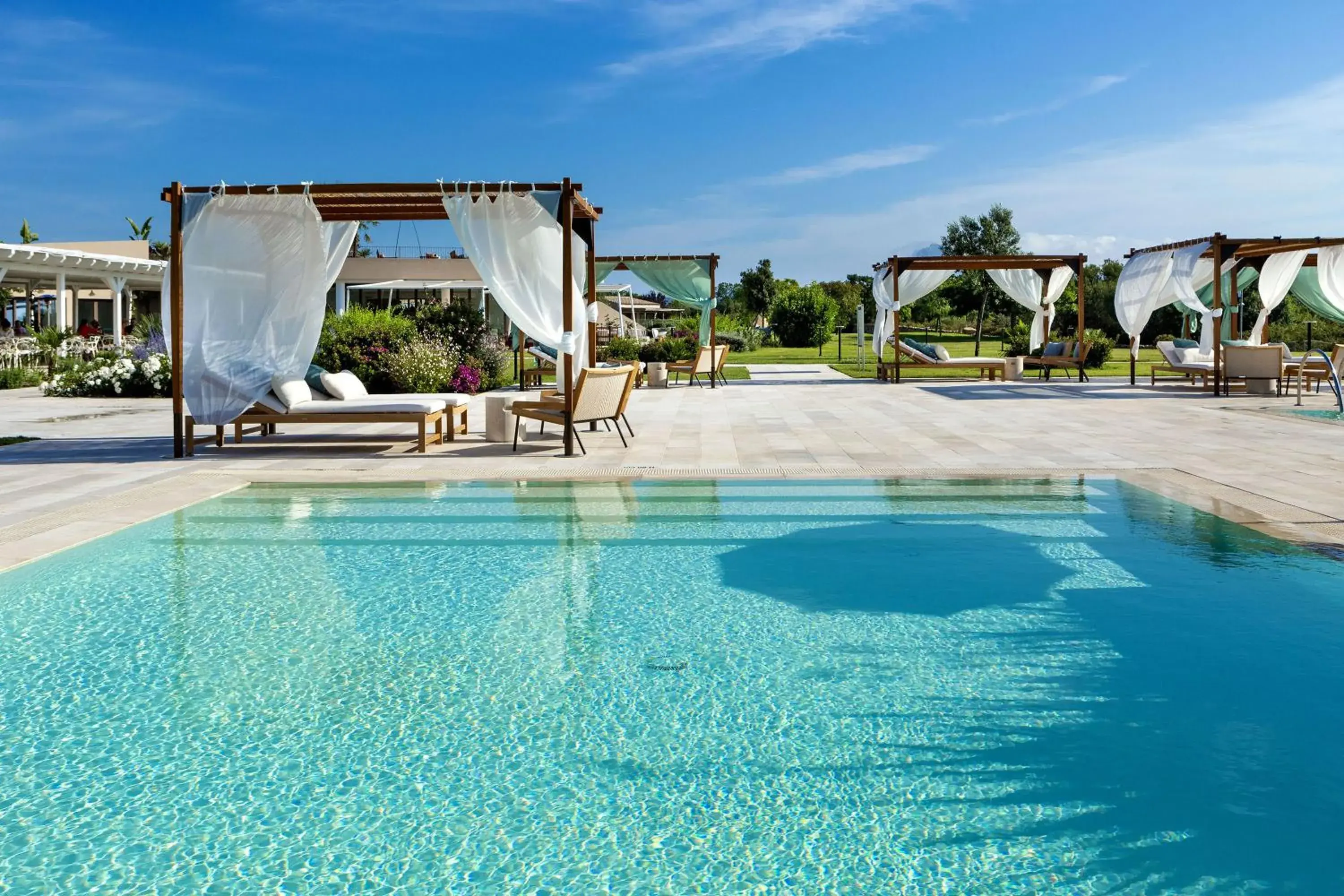 Property building, Swimming Pool in Baglioni Resort Sardinia - The Leading Hotels of the World