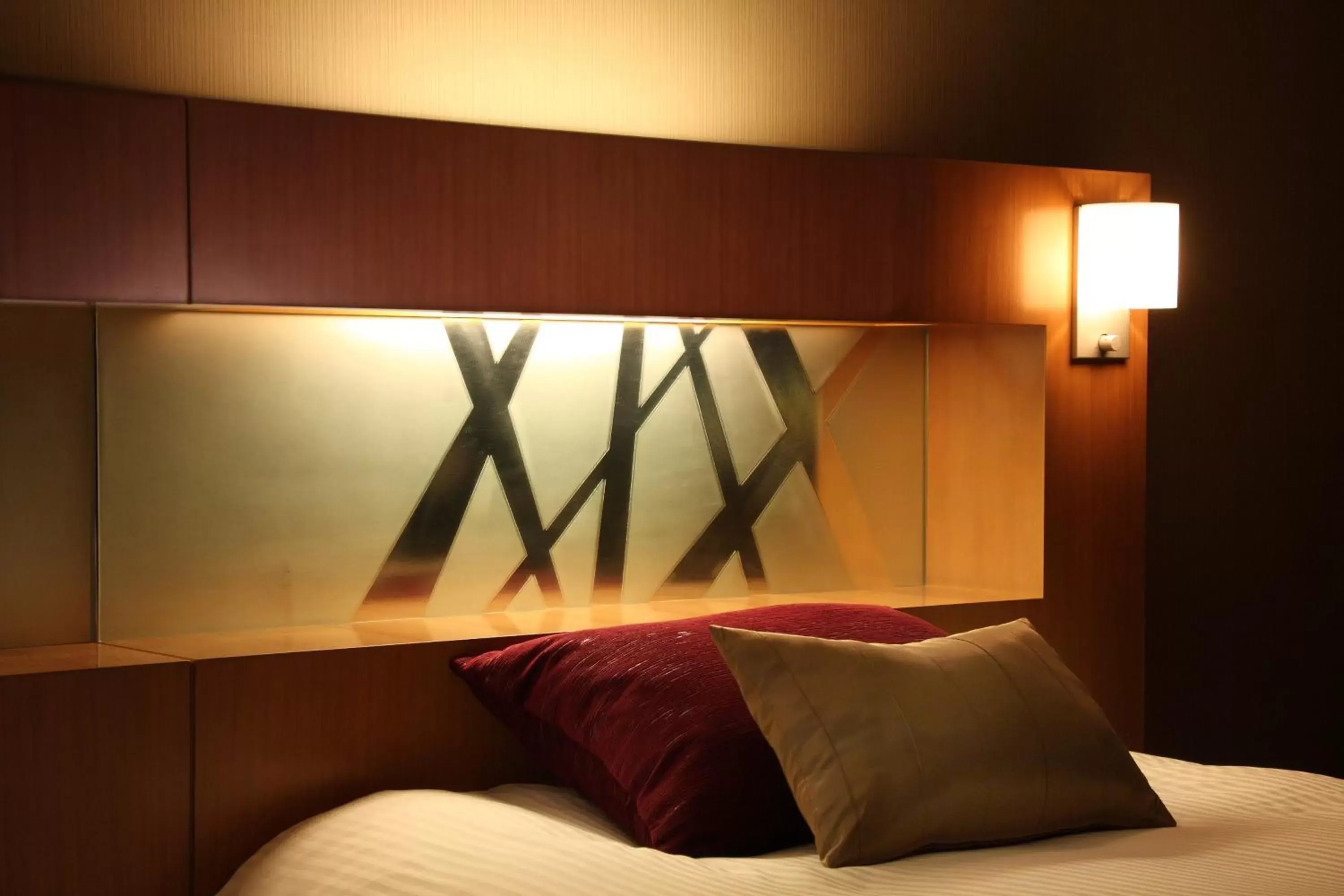 Decorative detail, Bed in Hotel Metropolitan Nagano