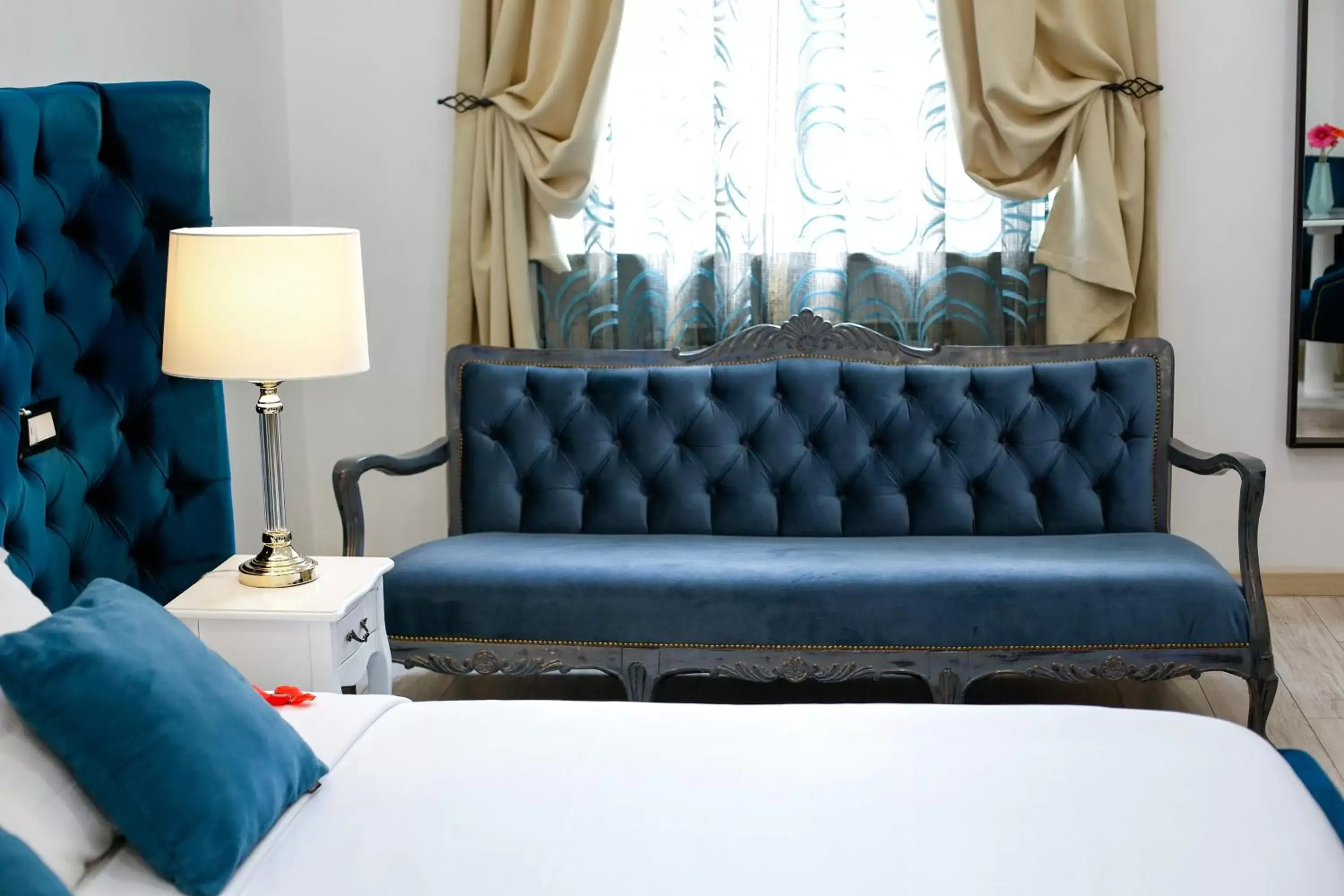 Bedroom, Seating Area in Escape Luxury Suite