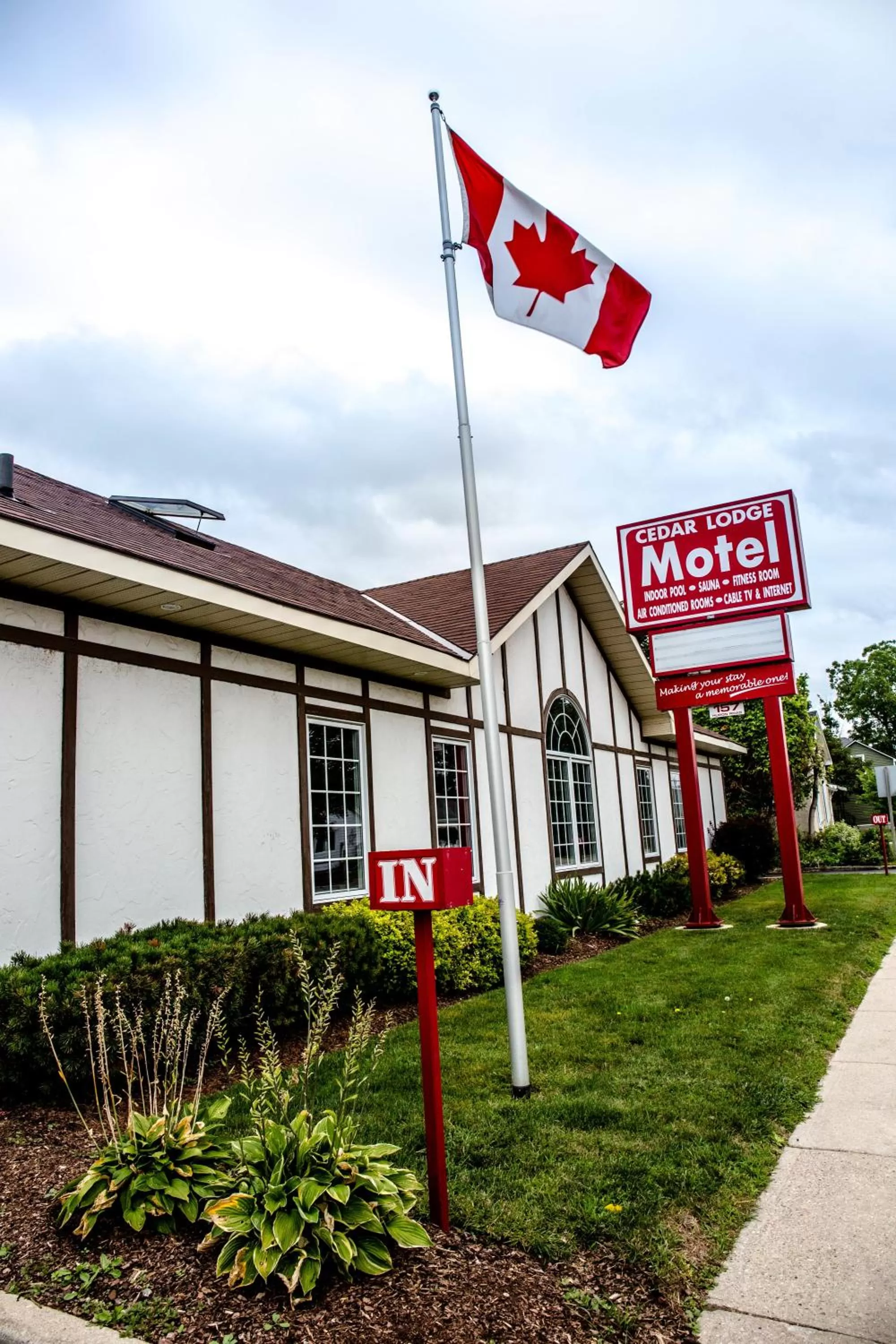 Property logo or sign in Cedar Lodge Motel