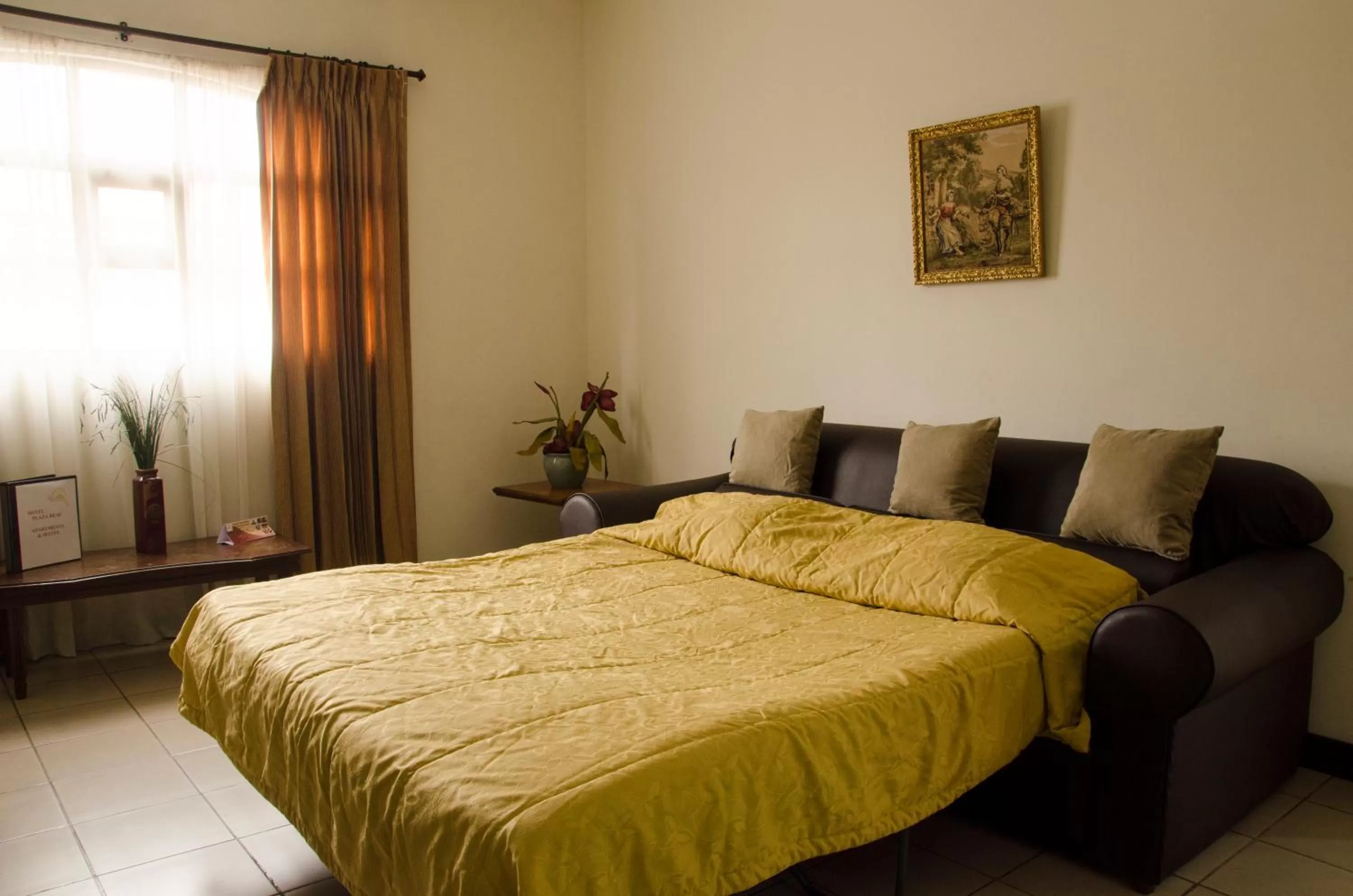 Bed in Hotel Plaza Real Suites & Apartments San Jose