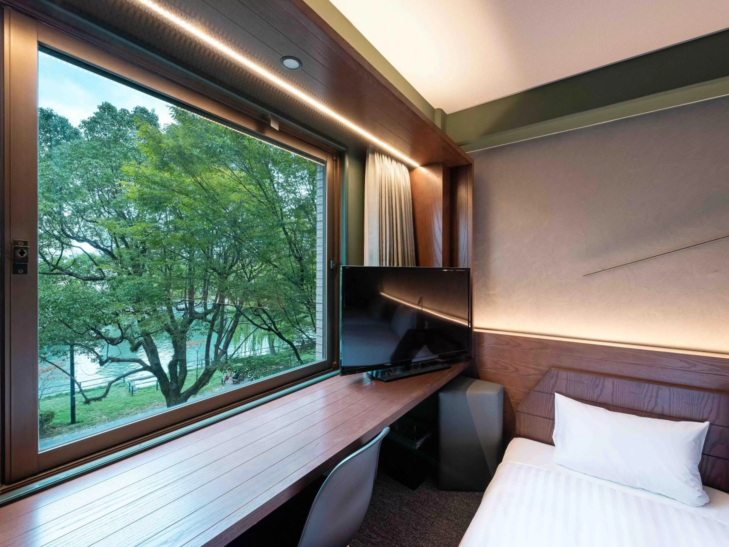 Photo of the whole room, Bed in EN HOTEL Hiroshima